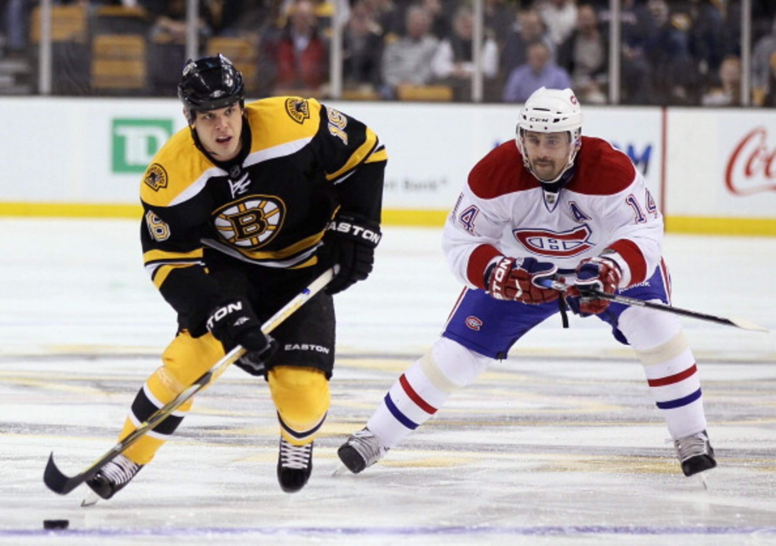 BOSTON, MA - MARCH 24: Nathan Horton #18 of the Boston Bruins takes the puck as Tomas Plekanec #14 of the Montreal Canadiens defends on March 24, 2011 at the TD Garden in Boston, Massachusetts. (Photo by Elsa/Getty Images) BOSTON, MA - MARCH 24: Nathan Horton #18 of the Boston Bruins takes the puck as Tomas Plekanec #14 of the Montreal Canadiens defends on March 24, 2011 at the TD Garden in Boston, Massachusetts. (Photo by Elsa/Getty Images)