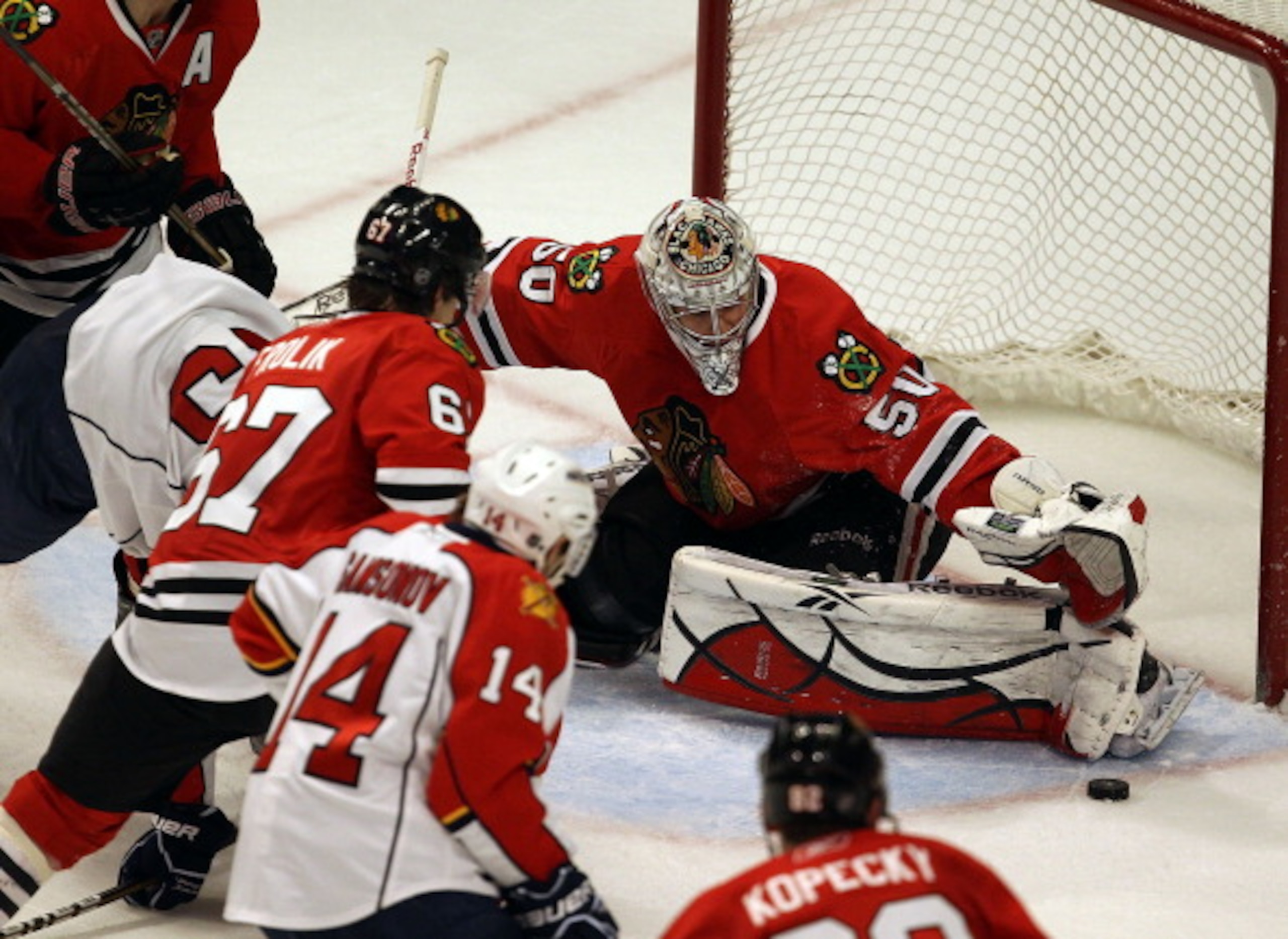 CHICAGO, IL - MARCH 23: Corey Crawford #50 of the Chicago Blackhawks makes a save against the Florida Panthers at the United Center on March 23, 2011 in Chicago, Illinois. The Blackhawks defeated the Panthers 4-0.  (Photo by Jonathan Daniel/Getty Images