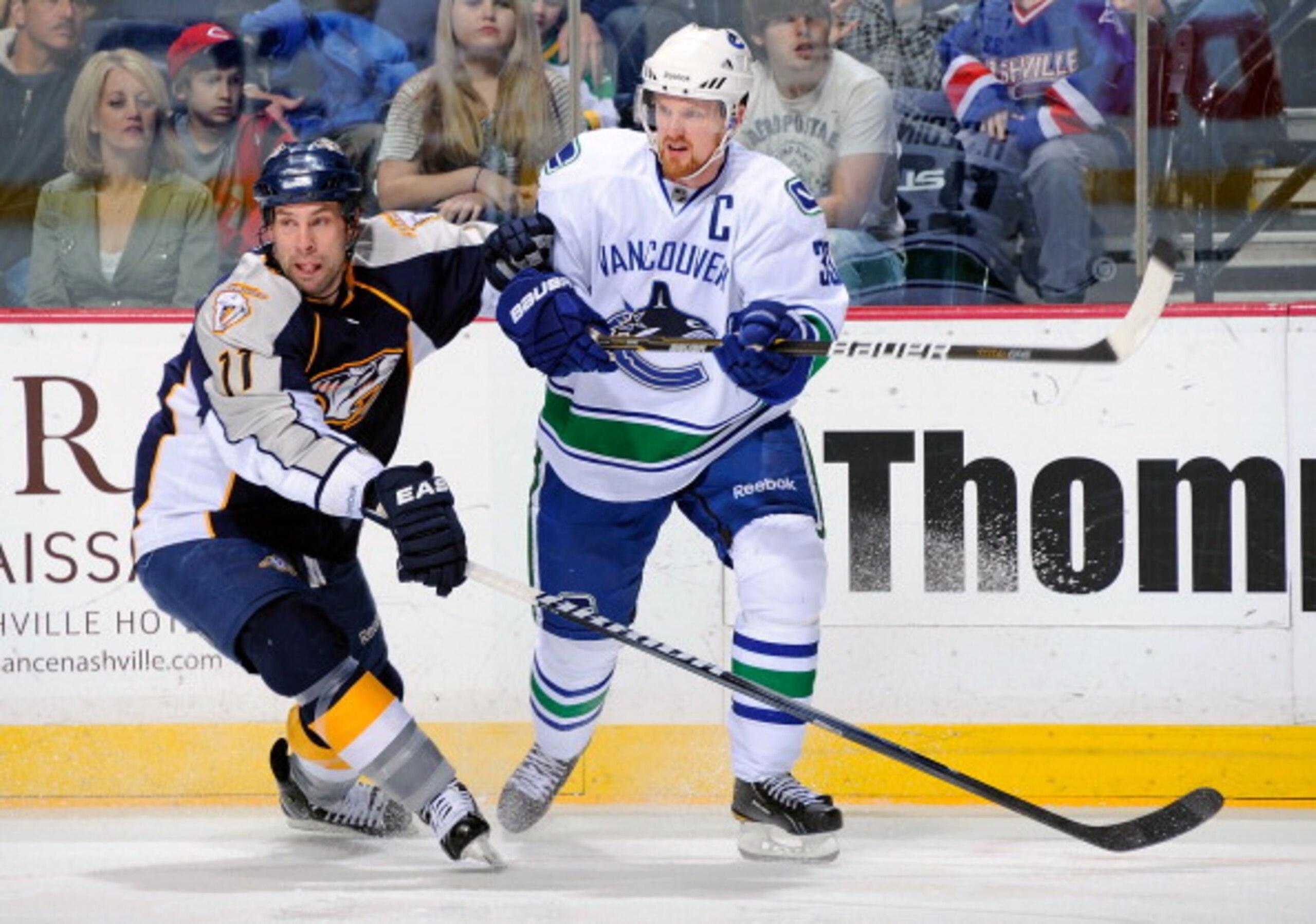 NASHVILLE, TN - MARCH 29: Henrik Sedin #33 of the Vancouver Canucks skates against David Legwand #11 of the Nashville Predators on March 29, 2011 at the Bridgestone Arena in Nashville, Tennessee. (Photo by Frederick Breedon/Getty Images) NASHVILLE, TN - MARCH 29: Henrik Sedin #33 of the Vancouver Canucks skates against David Legwand #11 of the Nashville Predators on March 29, 2011 at the Bridgestone Arena in Nashville, Tennessee. (Photo by Frederick Breedon/Getty Images)