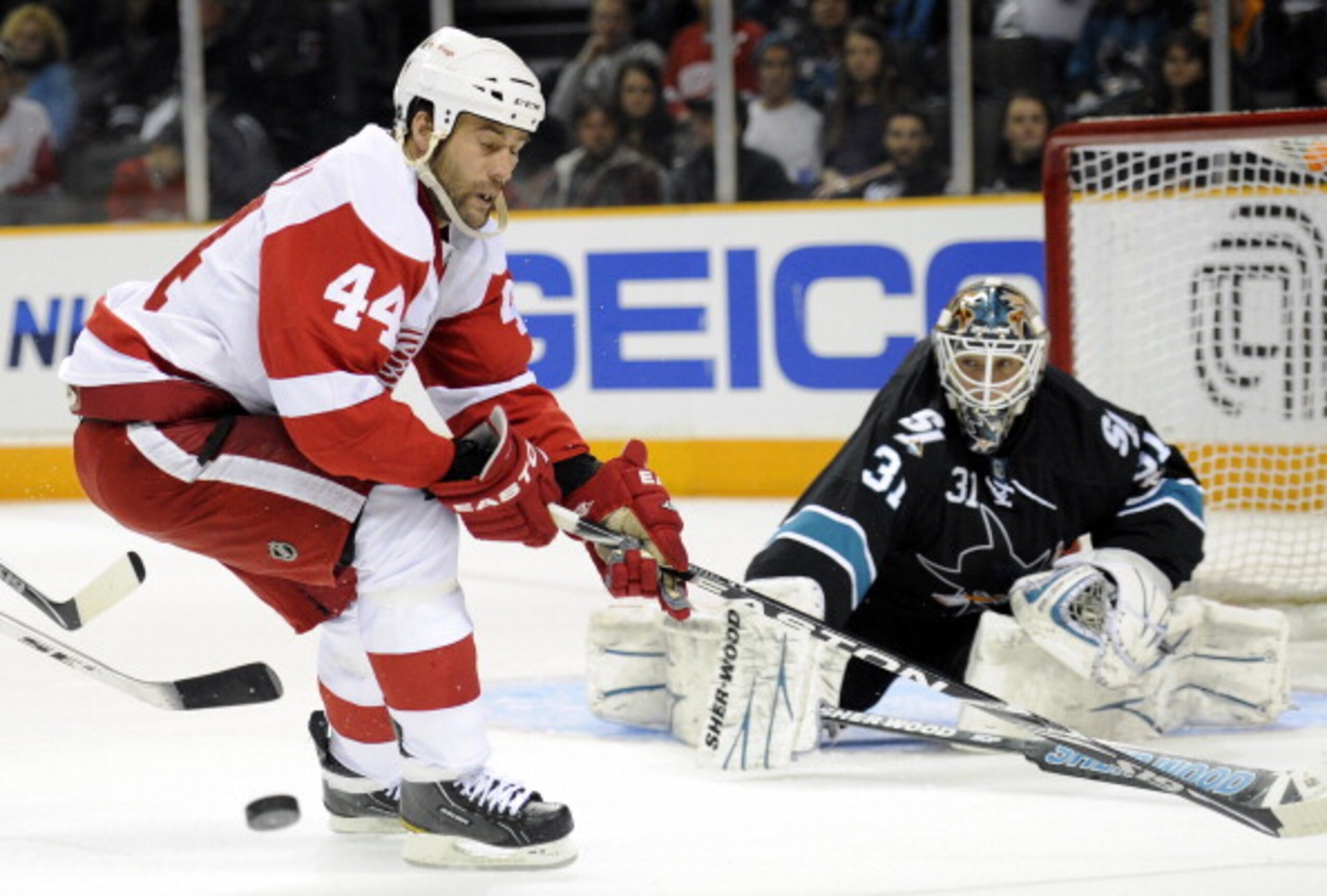 SAN JOSE, CA - MARCH 3: Todd Bertuzzi #44 of the Detroit Red Wings has the puck knocked away by goalie Antti Niemi #31 of the San Jose Sharks in the third period of an NHL hockey game at the HP Pavilion on March 3, 2011 in San Jose, California. The Sharks SAN JOSE, CA - MARCH 3: Todd Bertuzzi #44 of the Detroit Red Wings has the puck knocked away by goalie Antti Niemi #31 of the San Jose Sharks in the third period of an NHL hockey game at the HP Pavilion on March 3, 2011 in San Jose, California. The Sharks