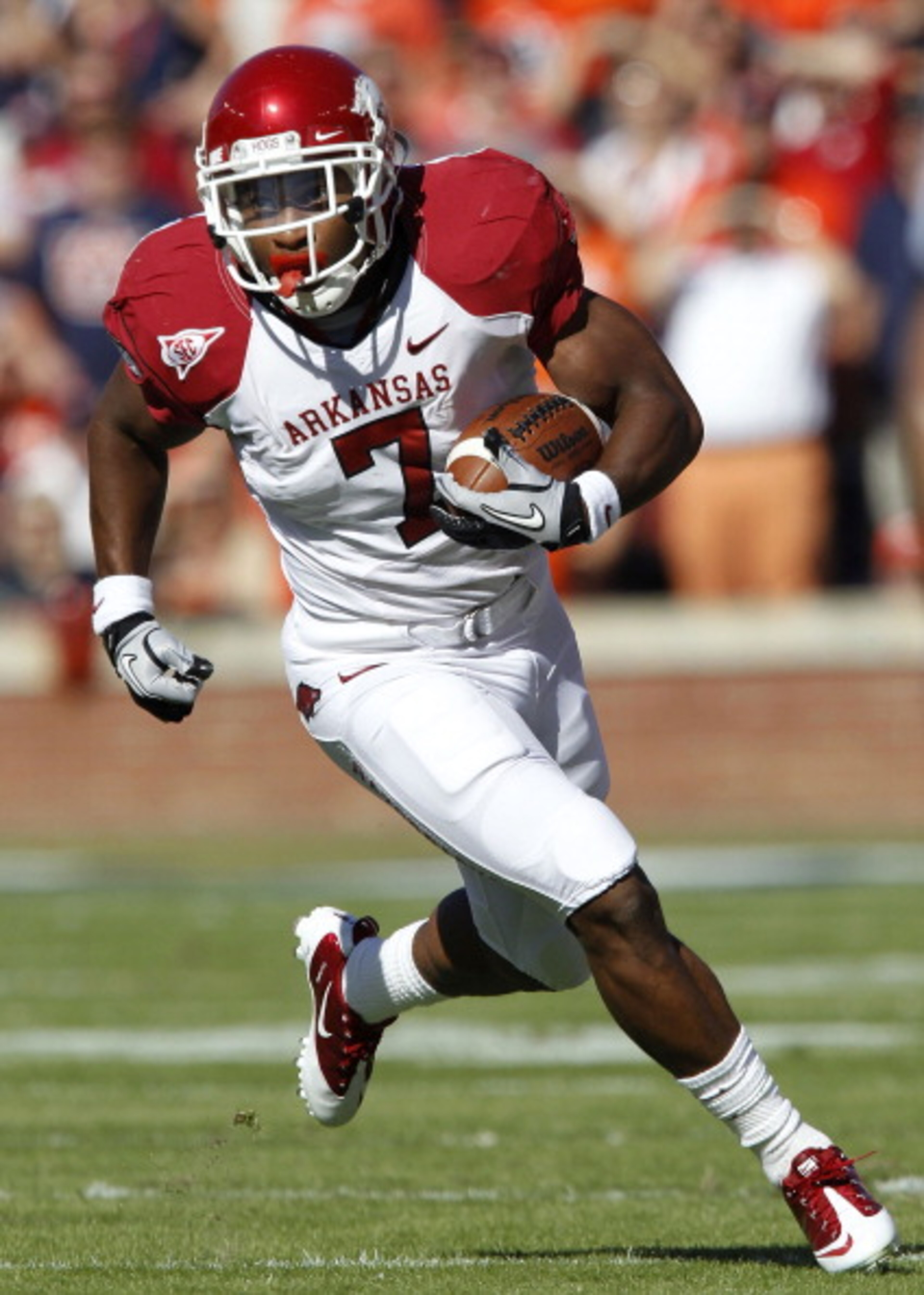AUBURN, AL - OCTOBER 16:  Running back Knile Davis #7 of the Arkansas Razorbacks runs with the ball during the game against the Auburn Tigers at Jordan-Hare Stadium on October 16, 2010 in Auburn, Alabama.  The Tigers beat the Razorbacks 65-43.  (Photo by