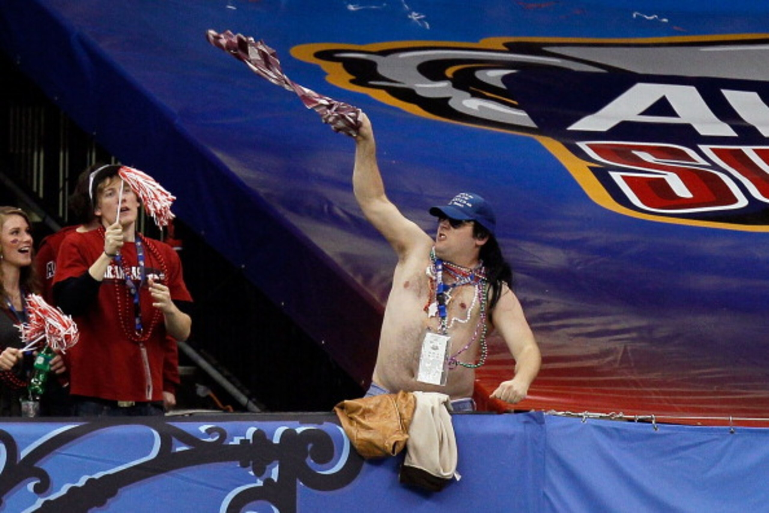 NEW ORLEANS, LA - JANUARY 04:  A fan cheers during the Allstate Sugar Bowl between the Arkansas Razorbacks and the Ohio State Buckeyes at the Louisiana Superdome on January 4, 2011 in New Orleans, Louisiana.  (Photo by Kevin C. Cox/Getty Images)