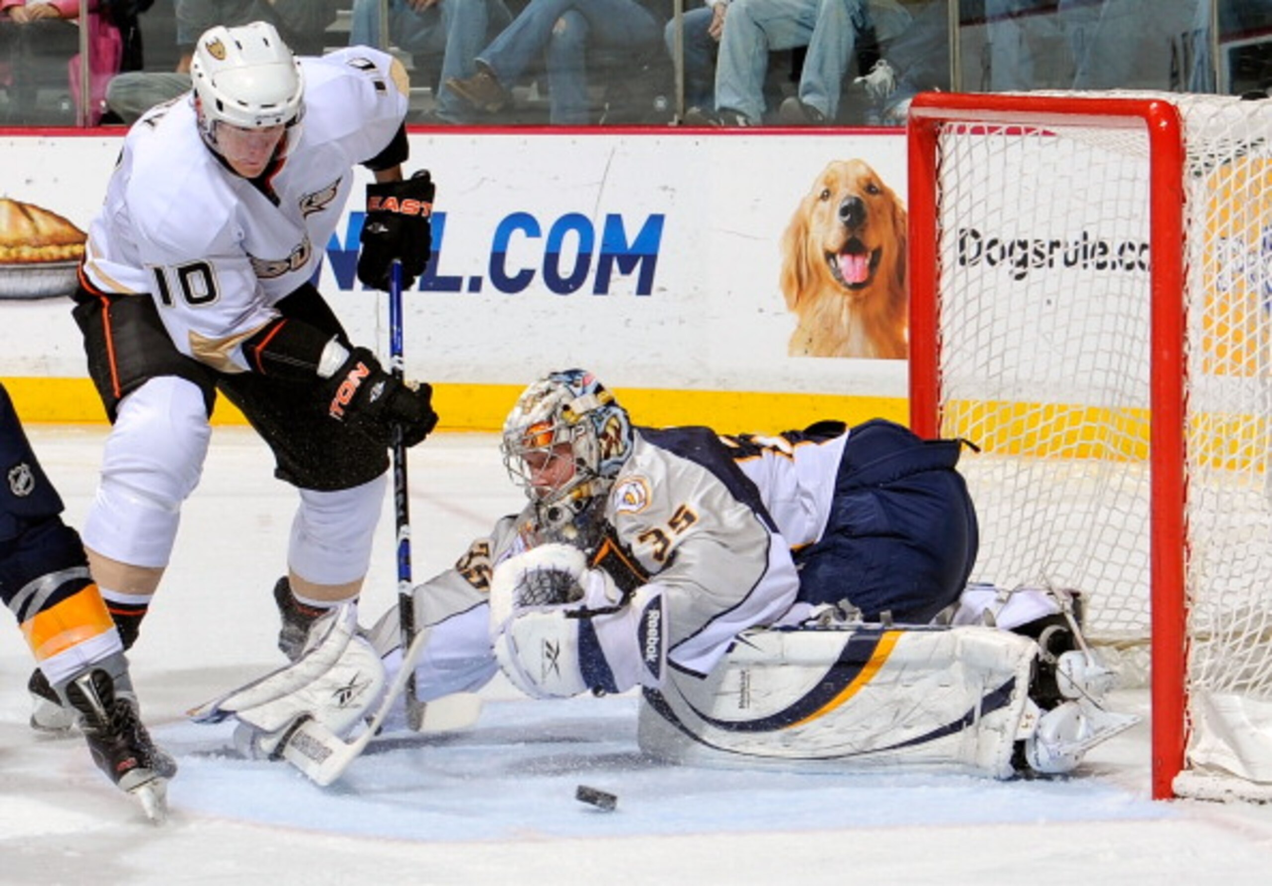 NASHVILLE, TN - MARCH 24:  Pekka Rinne #35 of the Nashville Predators makes a save on Corey Perry #10 of the Anaheim Ducks on March 24, 2011 at the Bridgestone Arena in Nashville, Tennessee.  (Photo by Frederick Breedon/Getty Images)