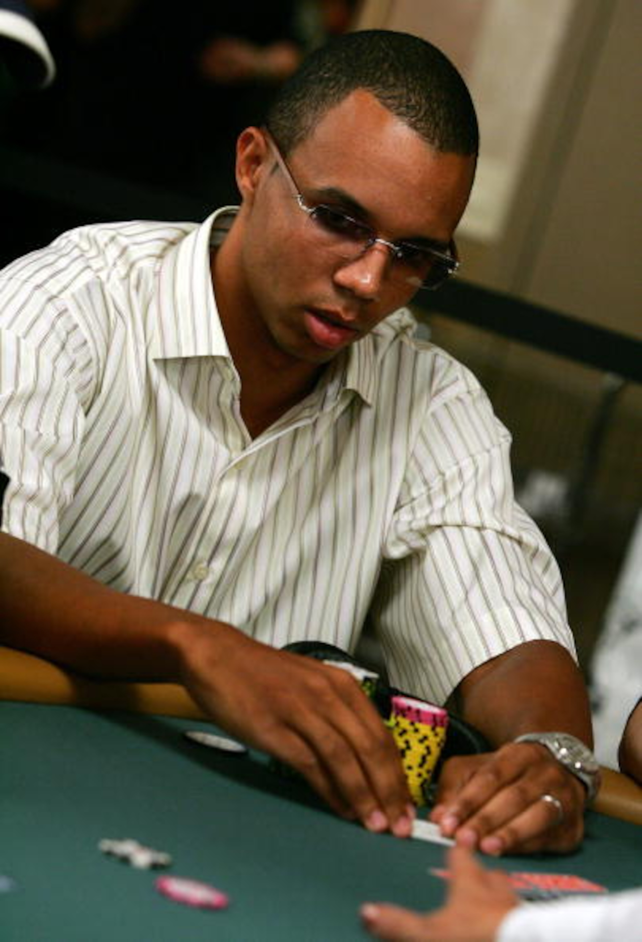 LAS VEGAS - JULY 29:  Poker player Phil Ivey competes on the second day of the first round of the World Series of Poker no-limit Texas Hold 'em main event at the Rio Hotel & Casino July 29, 2006 in Las Vegas, Nevada. More than 8,600 players have registere