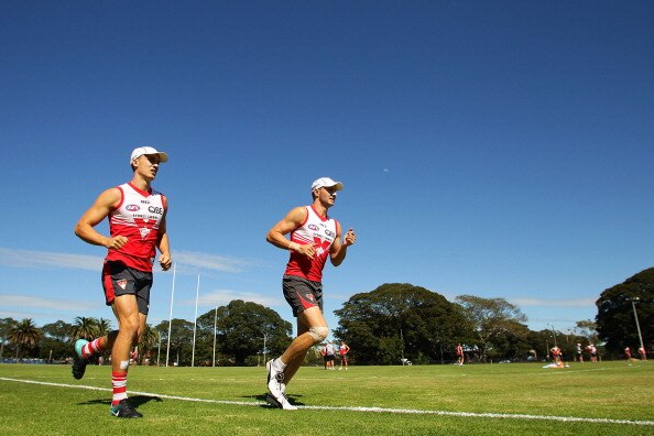 SYDNEY, AUSTRALIA - MARCH 25:  Ted Richards (L) and Tadhg Kennelly (R) jog during a Sydney Swans AFL training session at Moore Park on March 25, 2011 in Sydney, Australia.  (Photo by Matt King/Getty Images)