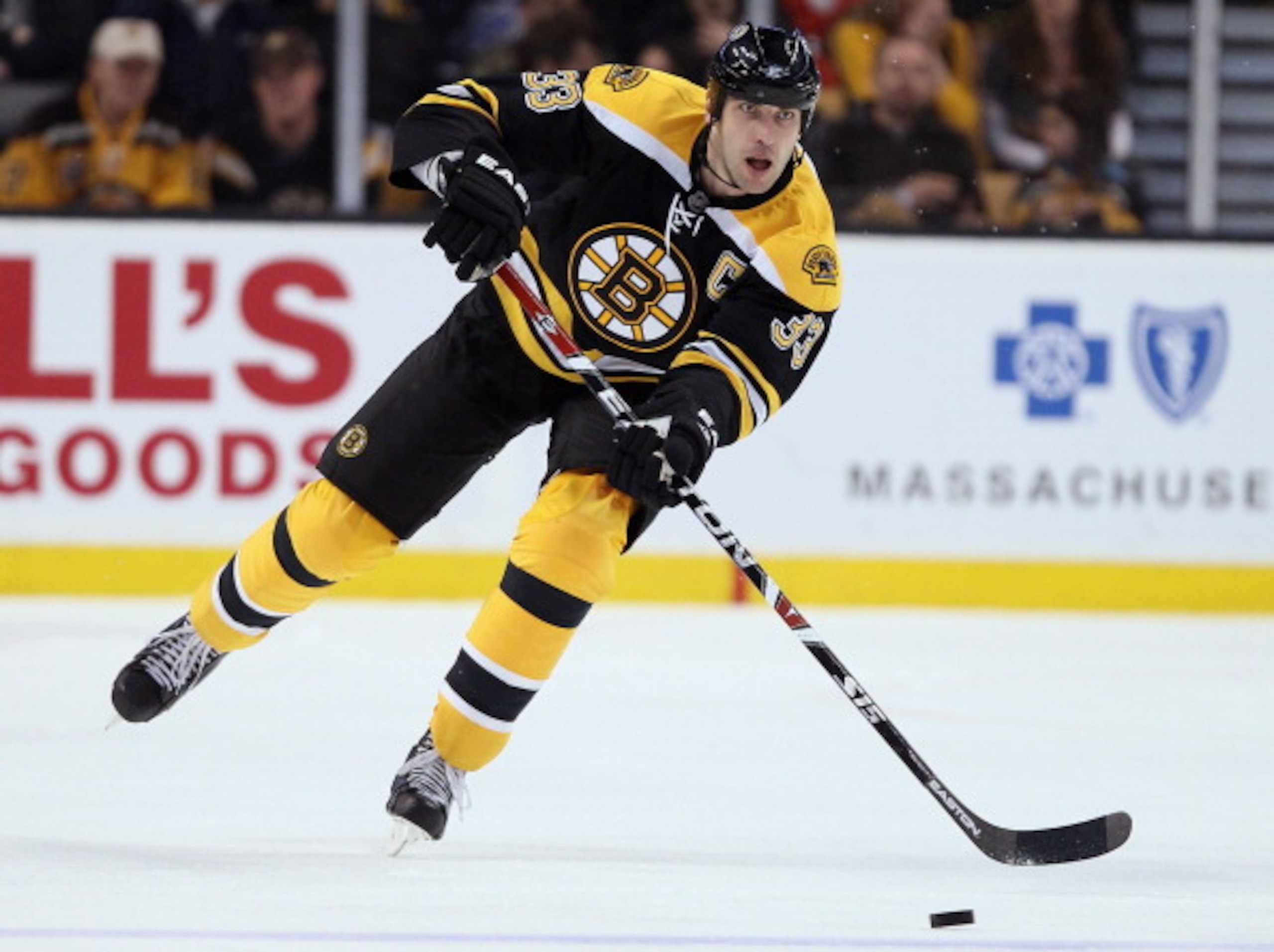 BOSTON, MA - MARCH 29:  Zdeno Chara #33 of the Boston Bruins takes the puck in the third period against the Chicago Blackhawks on March 29, 2011 at the TD Garden in Boston, Massachusetts. The Boston Bruins defeated the Chicago Blackhawks 3-0.  (Photo by E