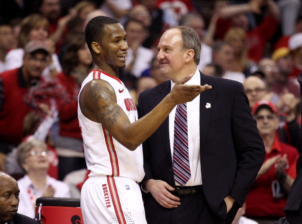 CLEVELAND, OH - MARCH 18: Jared Sullinger #0 of the Ohio State Buckeyes and head coach Thad Matta talk on the bench during the game against the Texas-San Antonio Roadrunners during the second round of the 2011 NCAA men's basketball tournament at Quicken L