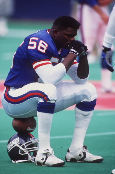 8 DEC 1991:  NEW YORK GIANTS LINEBACKER LAWRENCE TAYLOR GATHERS HIS THOUGHTS BEFORE THEIR 19-14 LOSS TO THE PHILADELPHIA GIANTS AT GIANTS STADIUM IN EAST RUTHERFORD, NEW JERSEY. Mandatory Credit: Rick Stewart/ALLSPORT