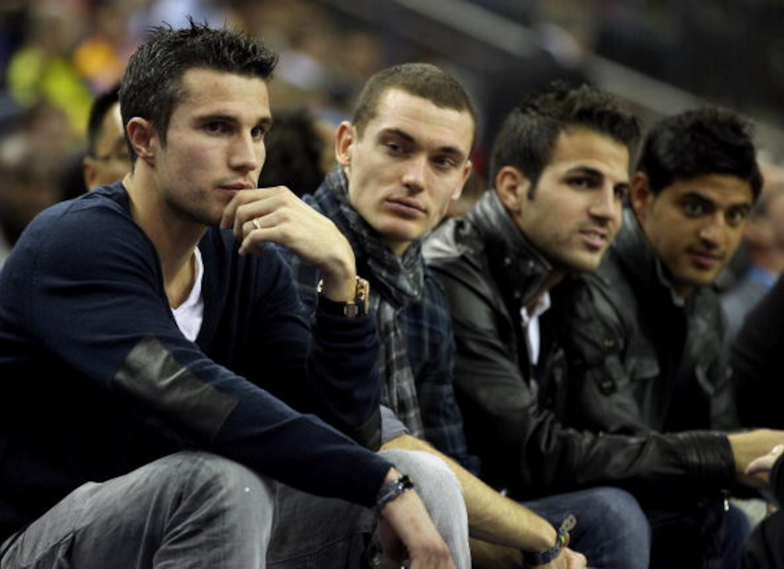 LONDON, ENGLAND - OCTOBER 04:  Arsenal footballers (L-R) Robin van Persie, Thomas Vermaelen, Francesc Fabregas and Carlos Vela during the NBA Europe Live match between the Los Angeles Lakers and the Minnesota Timberwolves at the O2 arena on October 4, 201