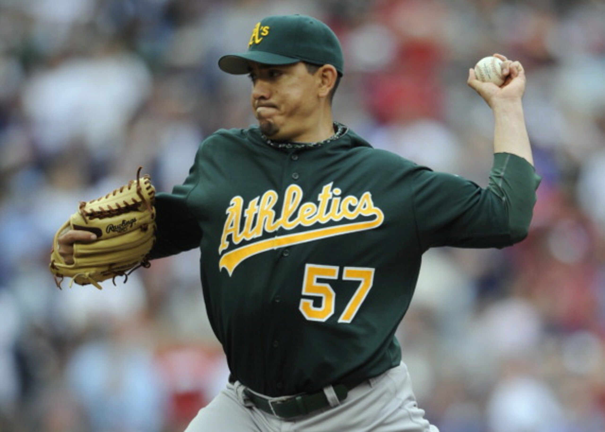 MINNEAPOLIS, MN - APRIL 10: Closer Brian Fuentes #57 of the Oakland Athletics throws against the Minnesota Twins during the ninth inning of their game on April 10, 2011 at Target Field in Minneapolis, Minnesota. Athletics defeated the Twins 5-3. (Photo by