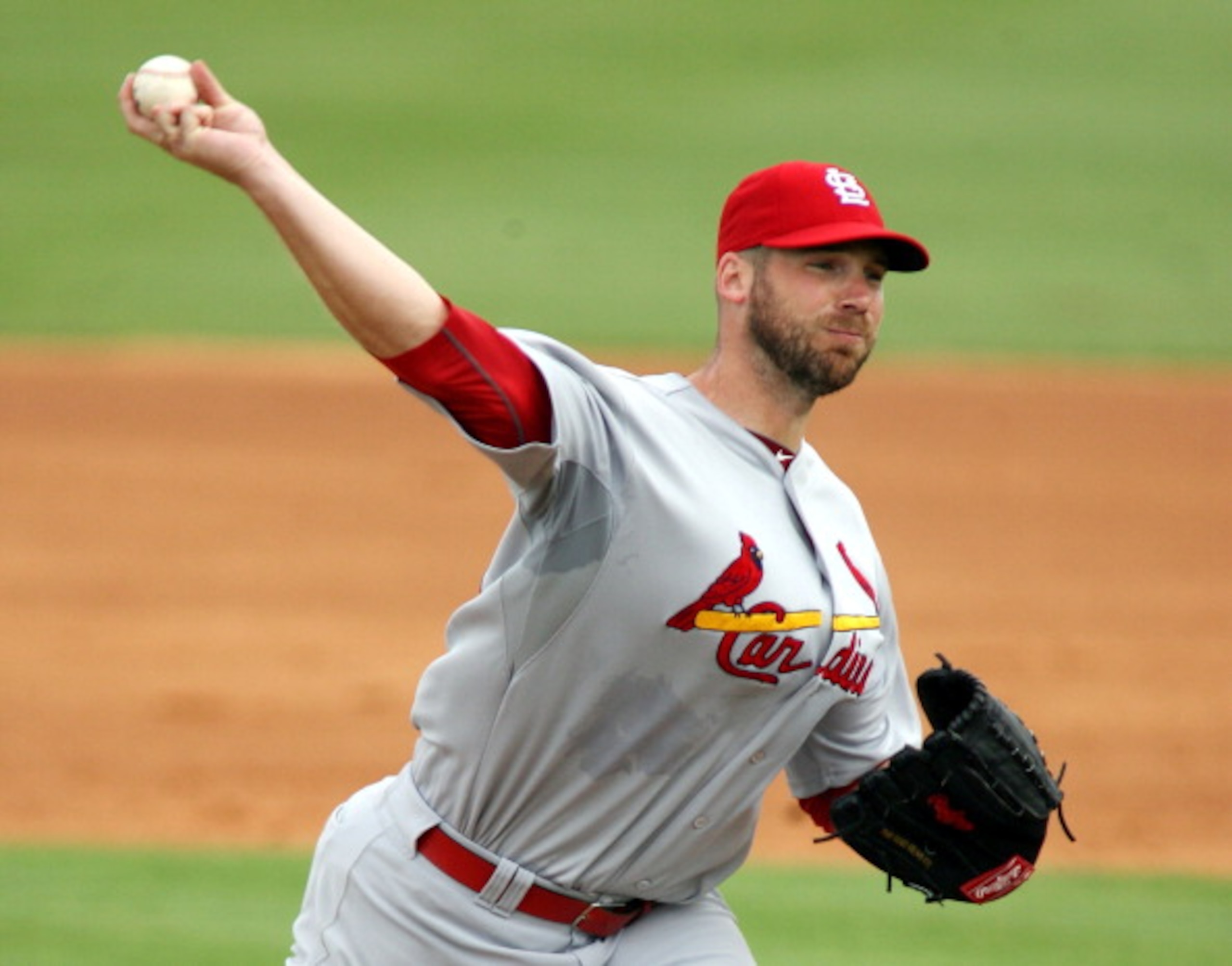 JUPITER, FL - MARCH 01:  Pitcher Chris Carpenter #29 of the St. Louis Cardinals throws against the Florida Marlins at Roger Dean Stadium on March 1, 2011 in Jupiter, Florida.  (Photo by Marc Serota/Getty Images)