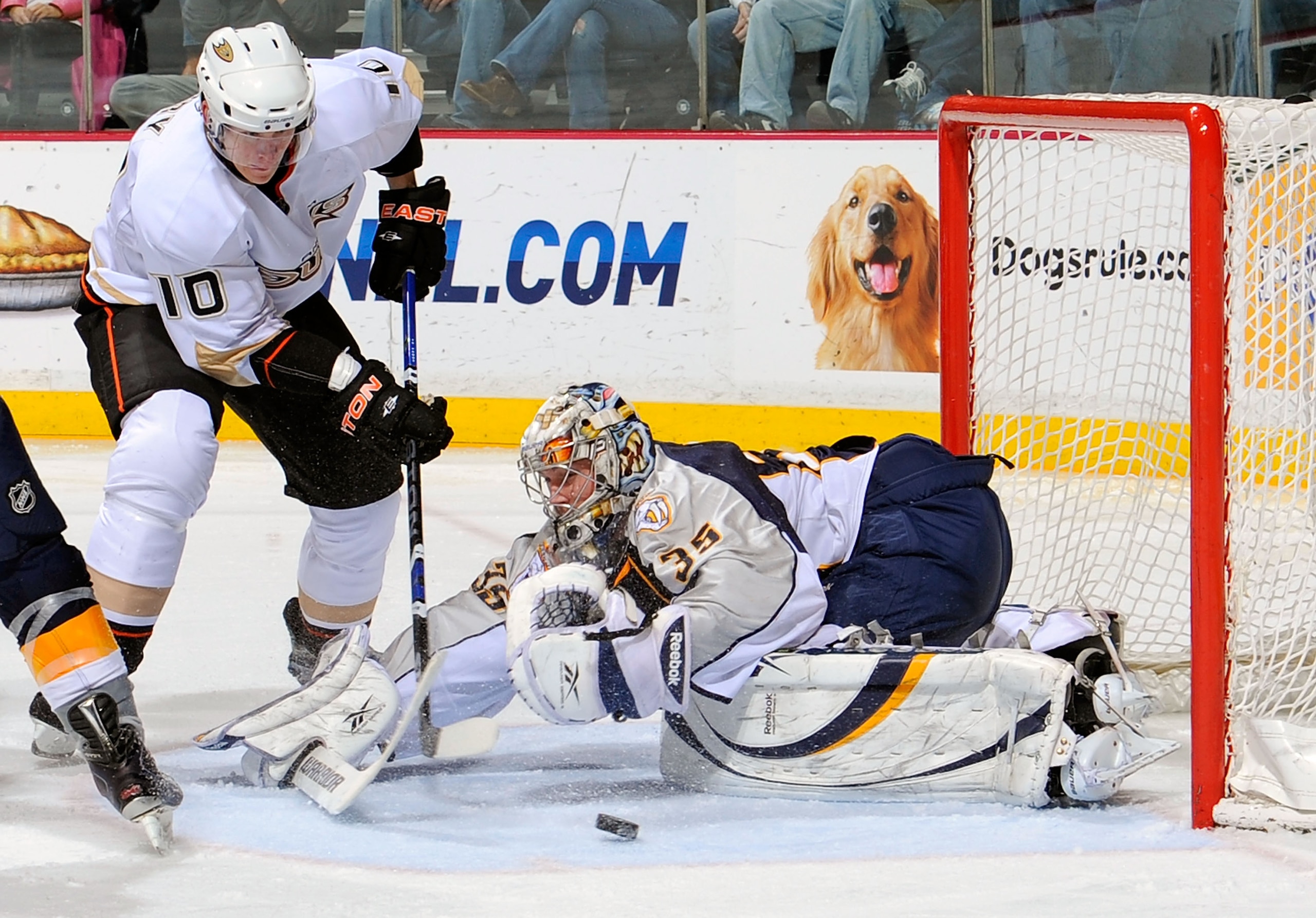 NASHVILLE, TN - MARCH 24:  Pekka Rinne #35 of the Nashville Predators makes a save on Corey Perry #10 of the Anaheim Ducks on March 24, 2011 at the Bridgestone Arena in Nashville, Tennessee.  (Photo by Frederick Breedon/Getty Images)
