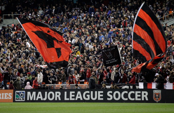 WASHINGTON, DC - APRIL 09: Fans waves flags  during the second half between the D.C. United and the Los Angeles Galaxy at RFK Stadium on April 9, 2011 in Washington, DC. The game ended in a 1-1  draw. (Photo by Rob Carr/Getty Images)