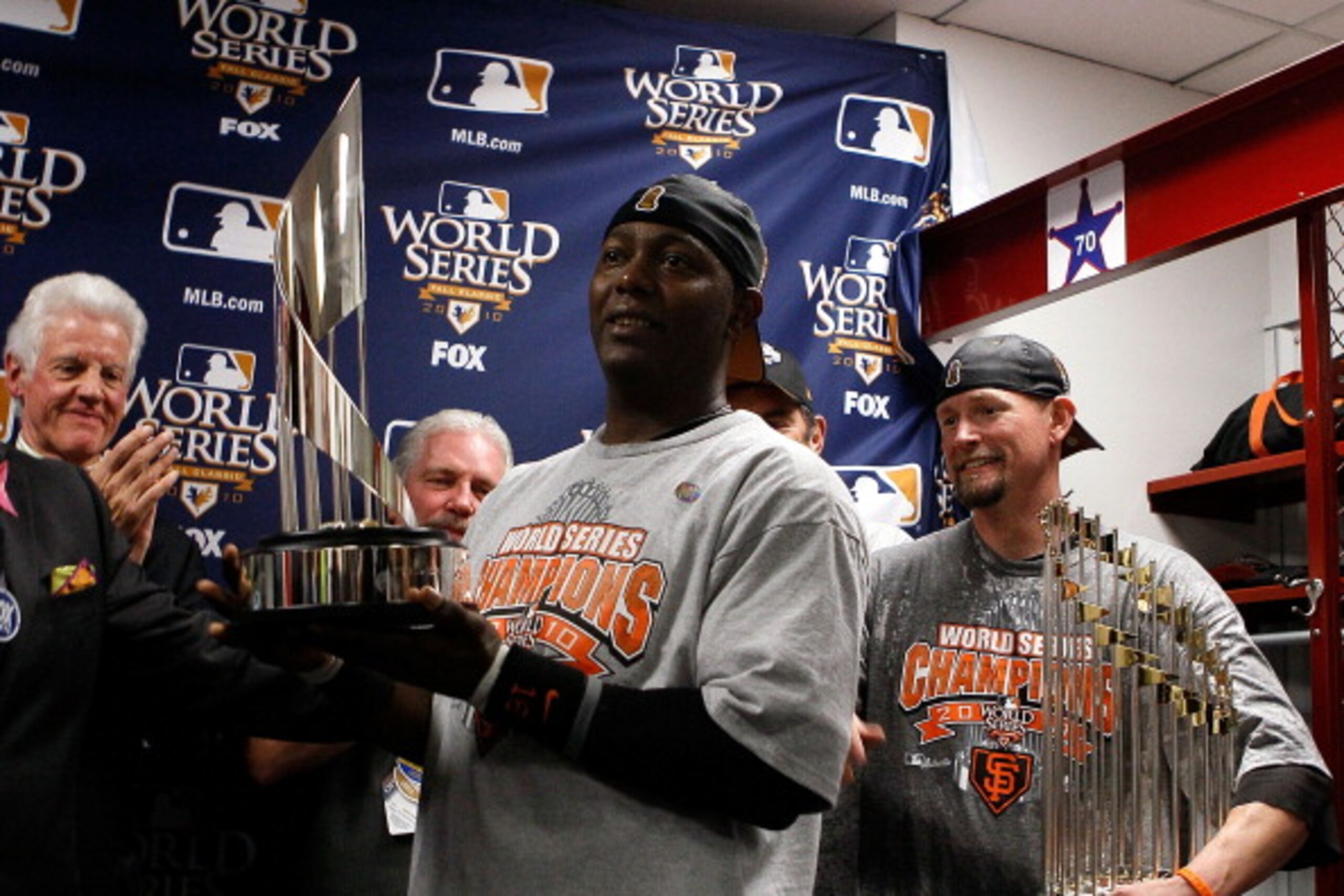 ARLINGTON, TX - NOVEMBER 01:  World Series MVP Edgar Renteria of the San Francisco Giants receives his MVP trophy in the locker room after the Giants won 3-1 against the Texas Rangers in Game Five of the 2010 MLB World Series at Rangers Ballpark in Arling