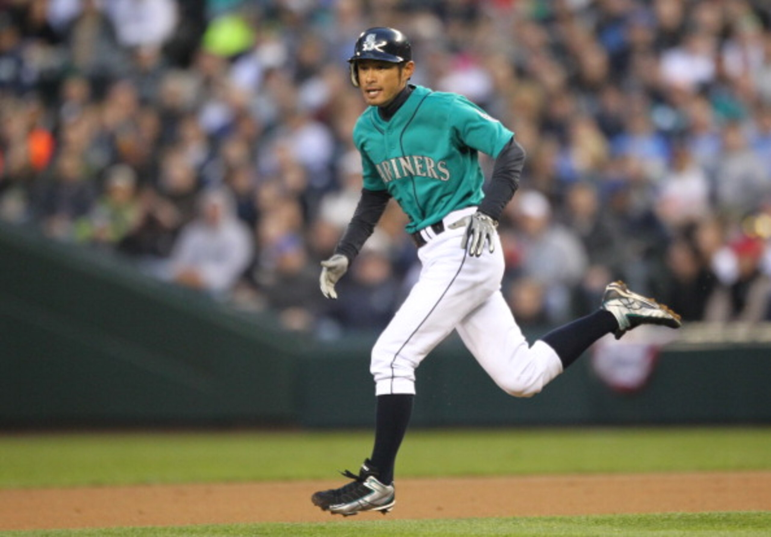 SEATTLE, WA - APRIL 08:  Ichiro Suzuki #51 of the Seattle Mariners runs the bases against the Cleveland Indians during the Mariners' home opener at Safeco Field on April 8, 2011 in Seattle, Washington. (Photo by Otto Greule Jr/Getty Images)