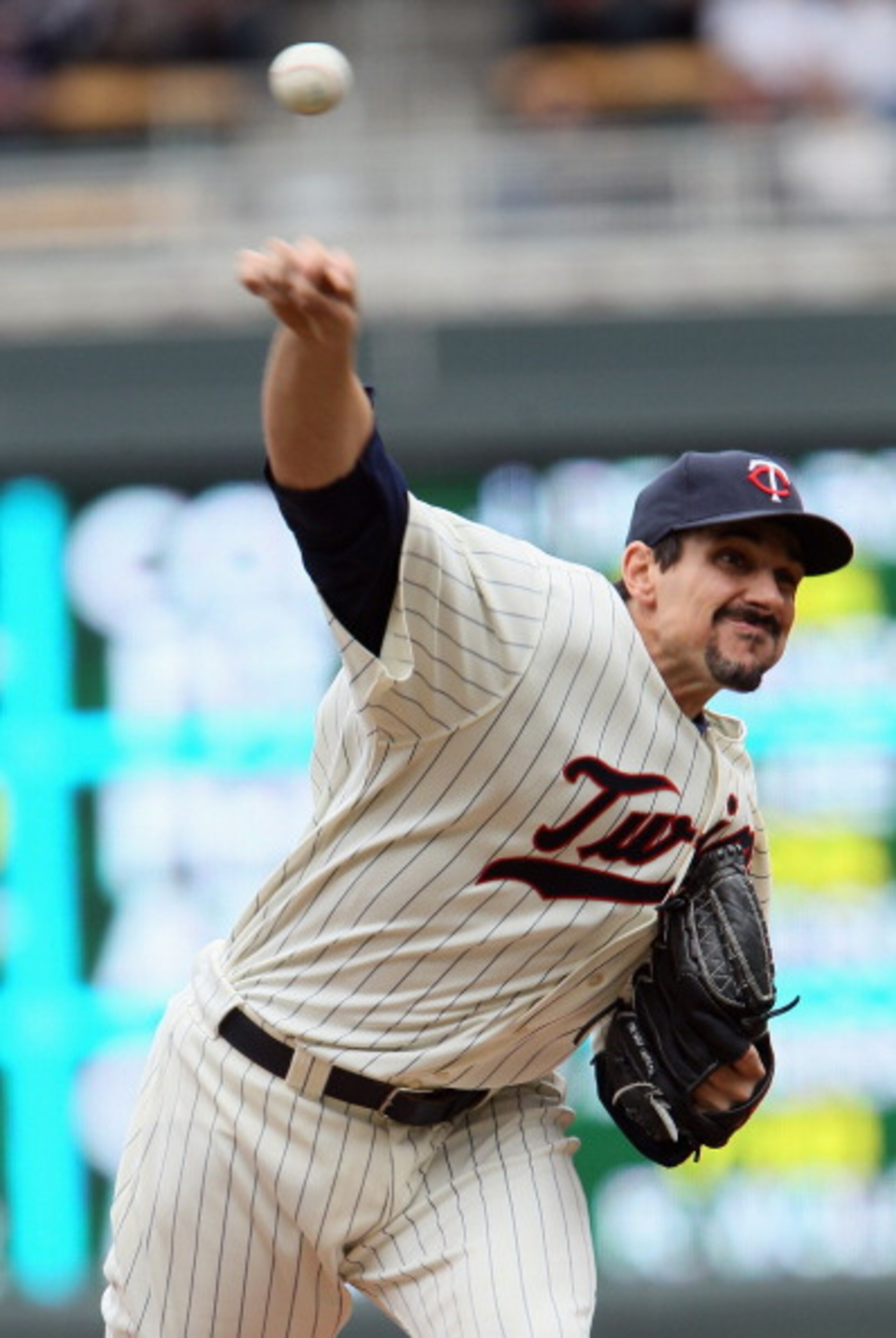 MINNEAPOLIS, MN - APRIL 08:  Carl Pavano #48 of the Minnesota Twins delivers a pitch against the Oakland Athletics during Opening Day on April 8, 2011 at Target Field in Minneapolis, Minnesota.  (Photo by Elsa/Getty Images)