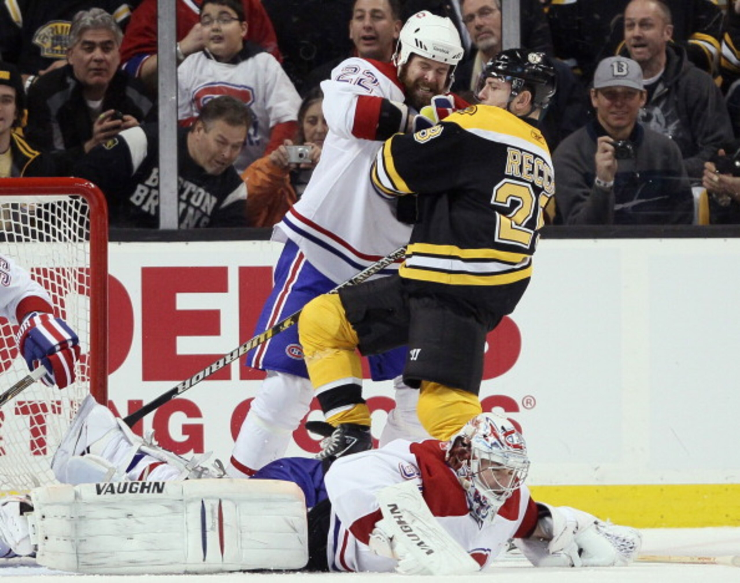 BOSTON, MA - MARCH 24: Paul Mara #22 of the Montreal Canadiens AND Mark Recchi #28 of the Boston Bruins get in a shoving match as Carey Price #31 stops a shot on March 24, 2011 at the TD Garden in Boston, Massachusetts. (Photo by Elsa/Getty Images) BOSTON, MA - MARCH 24: Paul Mara #22 of the Montreal Canadiens AND Mark Recchi #28 of the Boston Bruins get in a shoving match as Carey Price #31 stops a shot on March 24, 2011 at the TD Garden in Boston, Massachusetts. (Photo by Elsa/Getty Images)