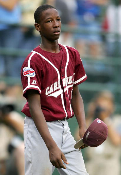 SOUTHWILLIAMSPORT, PA - AUGUST 28:  Jurickson Profar #14 of the Caribbean walks dejected after his team lost in an extra inning to Northwest during the Championship Game of the Little League World Series on August 28, 2005 at Lamade Stadium in South Willi
