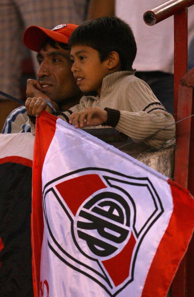 BUENOS AIRES, ARGENTINA - FEBRUARY 10:  River Plate fans watch the Primera Division closing season match between River Plate and Gimnasia de Jujuy at the Estadio Monumental on February 10, 2008 in Buenos Aires, Argentina.  (Photo by Julian Finney/Getty Im