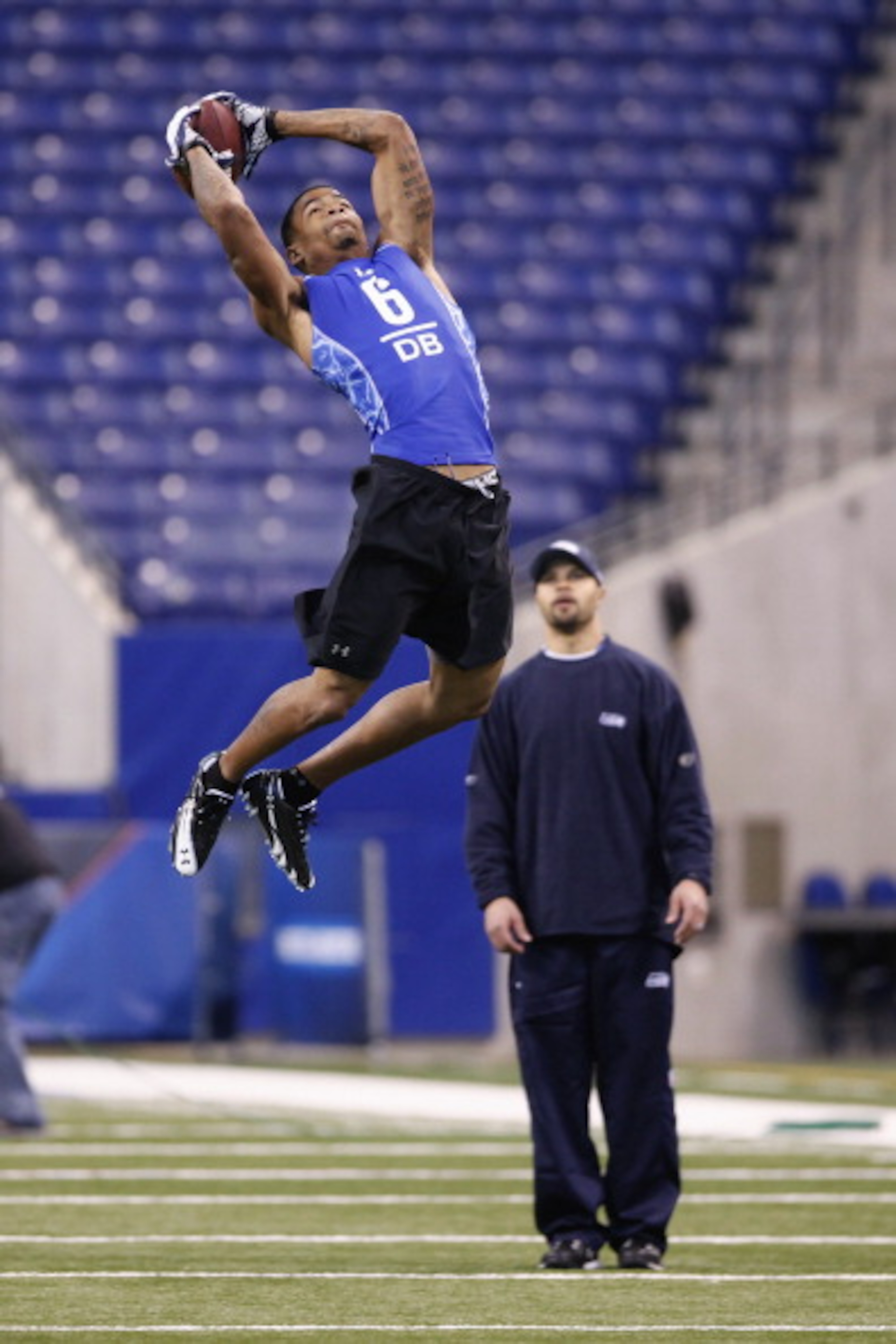 INDIANAPOLIS, IN - MARCH 1: Defensive back Curtis Brown #6 of Texas goes up for a pass during the 2011 NFL Scouting Combine at Lucas Oil Stadium on February 28, 2011 in Indianapolis, Indiana. (Photo by Joe Robbins/Getty Images)
