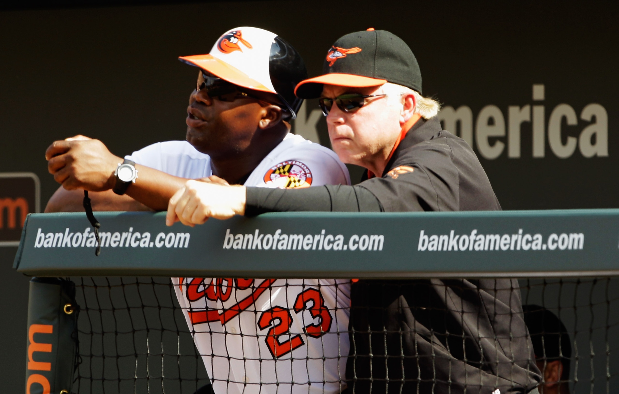 BALTIMORE, MD - APRIL 04: Manager Buck Showalter #26 of the Baltimore Orioles (R) talks with coach Wayne Kirby during opening day against the Detroit Tigers at Oriole Park at Camden Yards on April 4, 2011 in Baltimore, Maryland. (Photo by Rob Carr/Getty BALTIMORE, MD - APRIL 04: Manager Buck Showalter #26 of the Baltimore Orioles (R) talks with coach Wayne Kirby during opening day against the Detroit Tigers at Oriole Park at Camden Yards on April 4, 2011 in Baltimore, Maryland. (Photo by Rob Carr/Getty