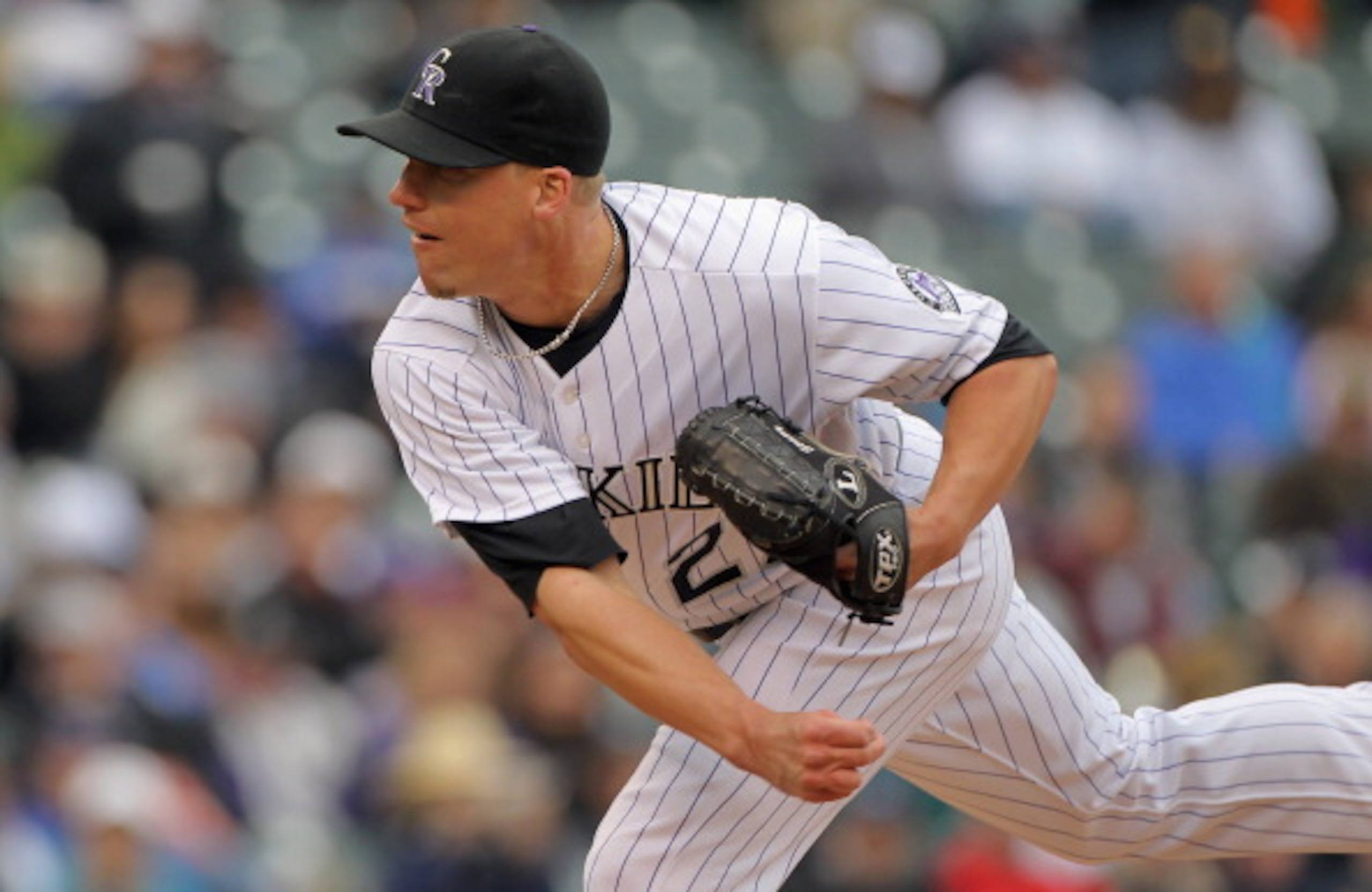 DENVER, CO - APRIL 06: Relief pitcher Matt Lindstrom #27 of the Colorado Rockies delivers against the Los Angeles Dodgers at Coors Field on April 6, 2011 in Denver, Colorado. (Photo by Doug Pensinger/Getty Images) DENVER, CO - APRIL 06: Relief pitcher Matt Lindstrom #27 of the Colorado Rockies delivers against the Los Angeles Dodgers at Coors Field on April 6, 2011 in Denver, Colorado. (Photo by Doug Pensinger/Getty Images)