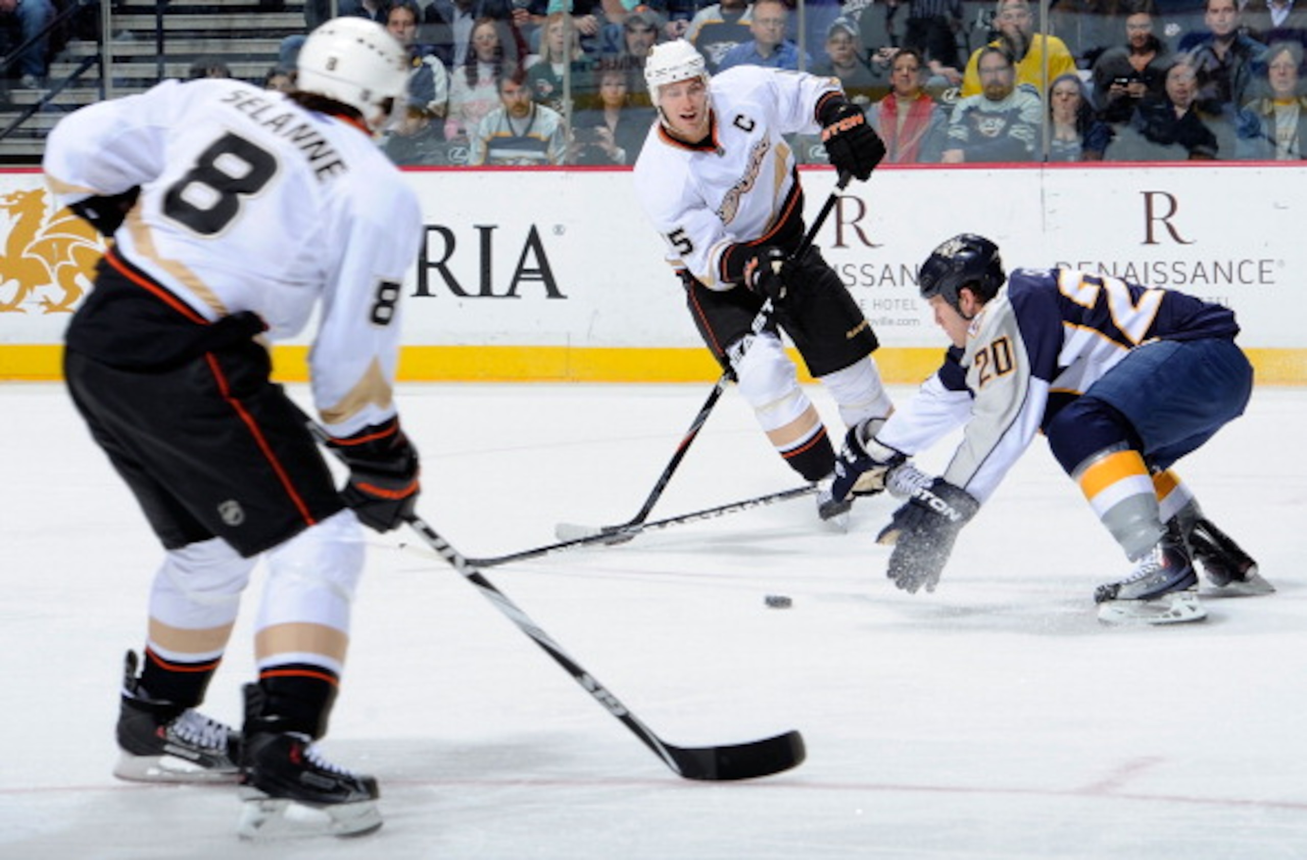 NASHVILLE, TN - MARCH 24:  Ryan Suter #20 of the Nashville Predators tries to break up a pass from Ryan Getzlaf #10 to Teemu Selanne #8 of the Anaheim Ducks on March 24, 2011 at the Bridgestone Arena in Nashville, Tennessee.  (Photo by Frederick Breedon/G