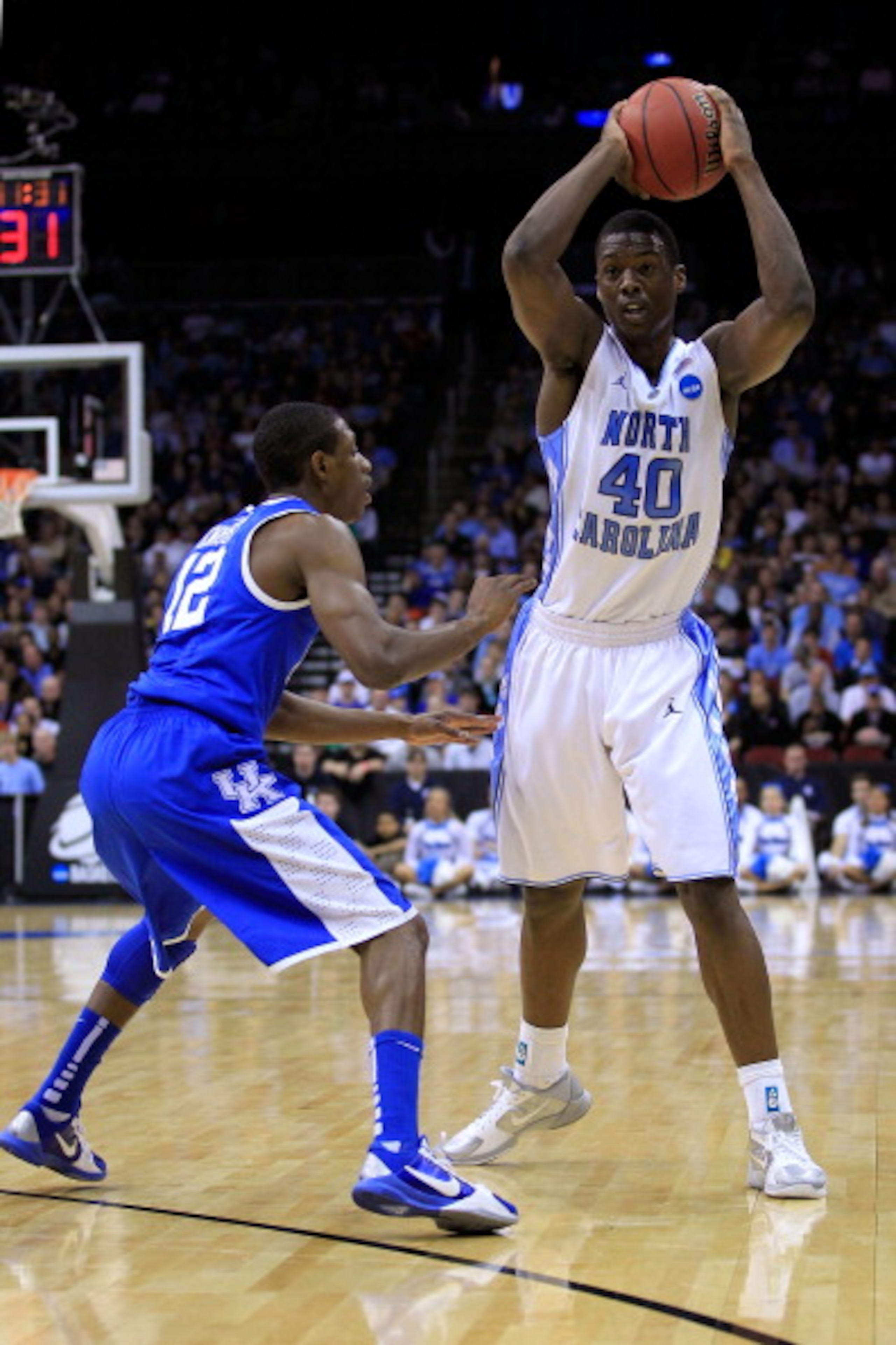 NEWARK, NJ - MARCH 27: Harrison Barnes #40 of the North Carolina Tar Heels in action against Brandon Knight #12 of the Kentucky Wildcats during the east regional final of the 2011 NCAA men's basketball tournament at Prudential Center on March 27, 2011 in NEWARK, NJ - MARCH 27: Harrison Barnes #40 of the North Carolina Tar Heels in action against Brandon Knight #12 of the Kentucky Wildcats during the east regional final of the 2011 NCAA men's basketball tournament at Prudential Center on March 27, 2011 in