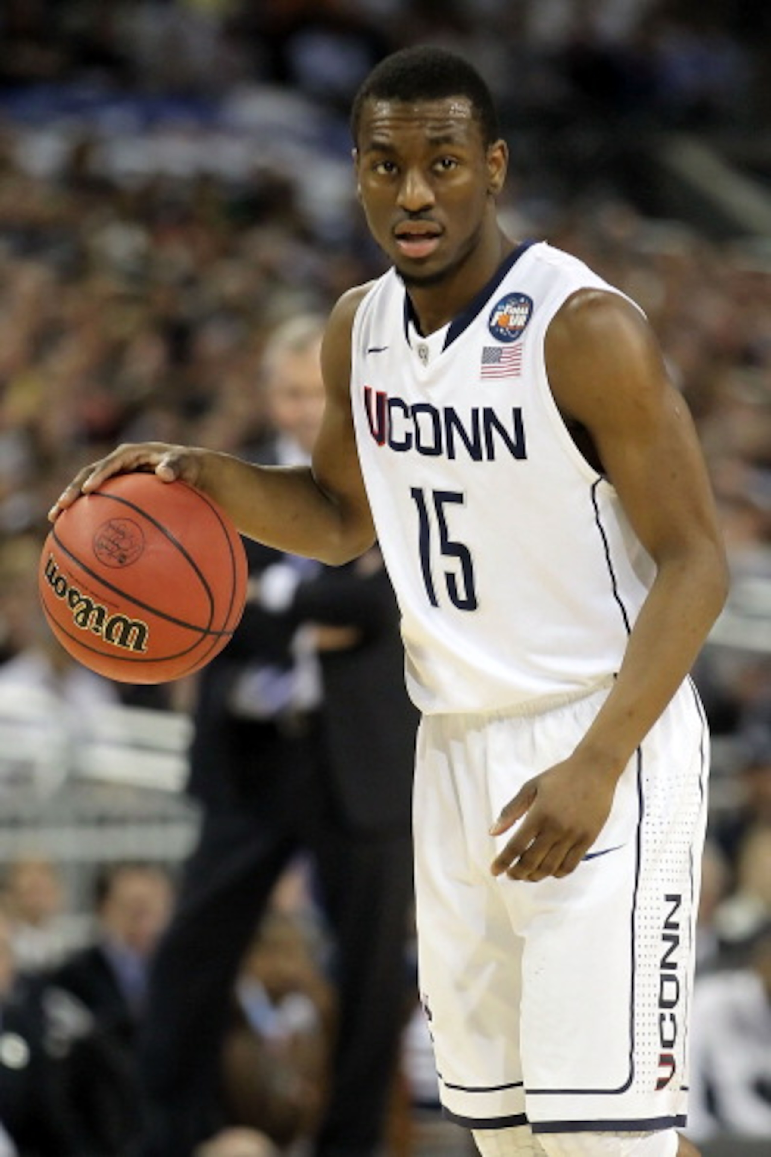 HOUSTON, TX - APRIL 04: Kemba Walker #15 of the Connecticut Huskies handles the ball against the Butler Bulldogs during the National Championship Game of the 2011 NCAA Division I Men's Basketball Tournament at Reliant Stadium on April 4, 2011 in Houston, HOUSTON, TX - APRIL 04: Kemba Walker #15 of the Connecticut Huskies handles the ball against the Butler Bulldogs during the National Championship Game of the 2011 NCAA Division I Men's Basketball Tournament at Reliant Stadium on April 4, 2011 in Houston,