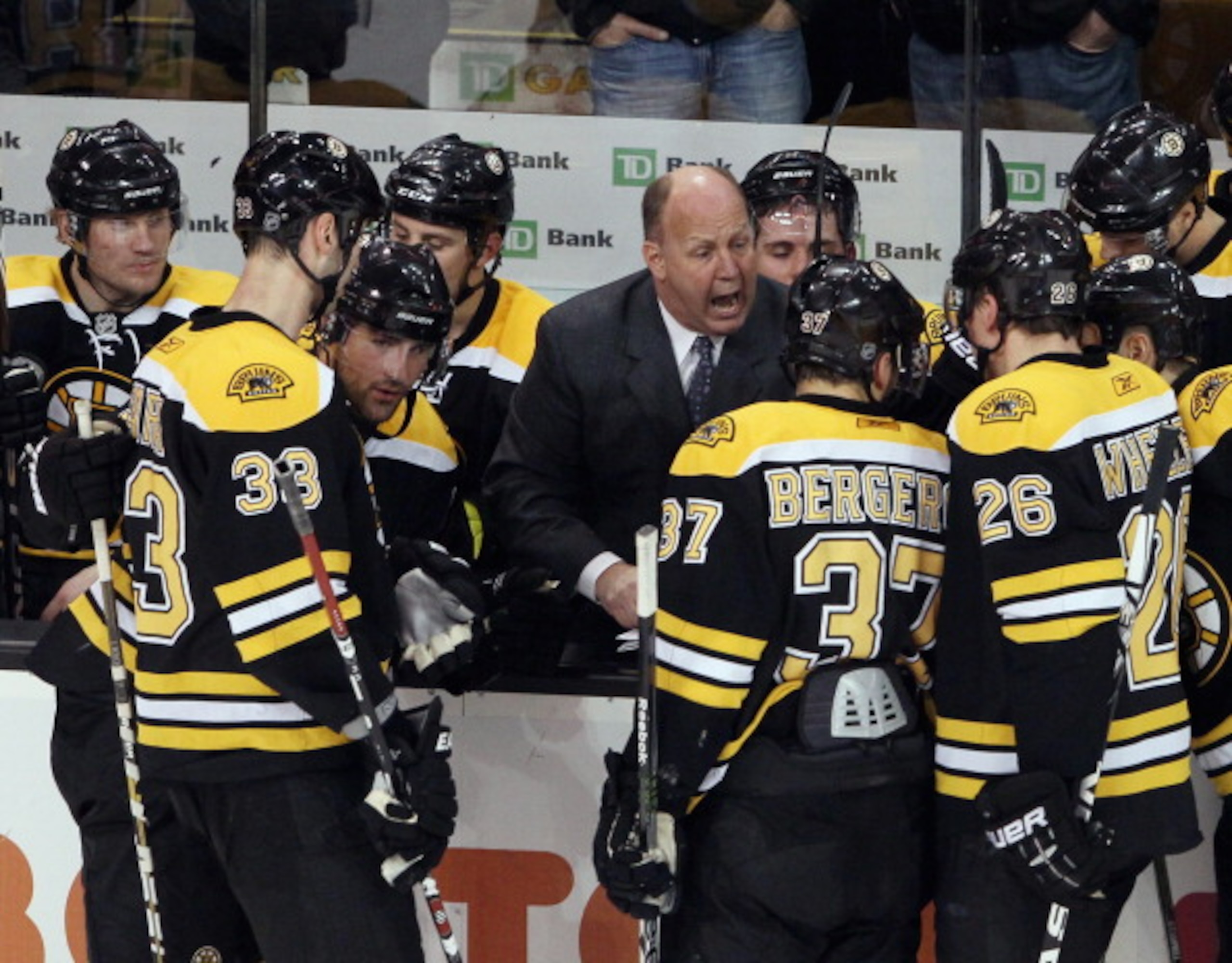 BOSTON, MA - JANUARY 13: Head coach Claude Julien of the Boston Bruins talks with his players during a time out in the third period against the Philadelphia Flyers on January 13, 2011 at the TD Garden in Boston, Massachusetts. The Bruins defeated the Fly BOSTON, MA - JANUARY 13: Head coach Claude Julien of the Boston Bruins talks with his players during a time out in the third period against the Philadelphia Flyers on January 13, 2011 at the TD Garden in Boston, Massachusetts. The Bruins defeated the Fly