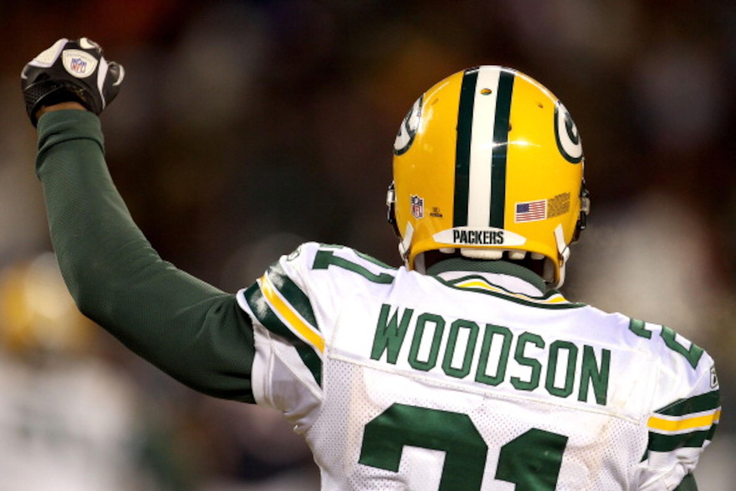 CHICAGO, IL - JANUARY 23:  Charles Woodson #21 of the Green Bay Packers reacts in the fourth quarter against the Chicago Bears in the NFC Championship Game at Soldier Field on January 23, 2011 in Chicago, Illinois.  (Photo by Jonathan Daniel/Getty Images)