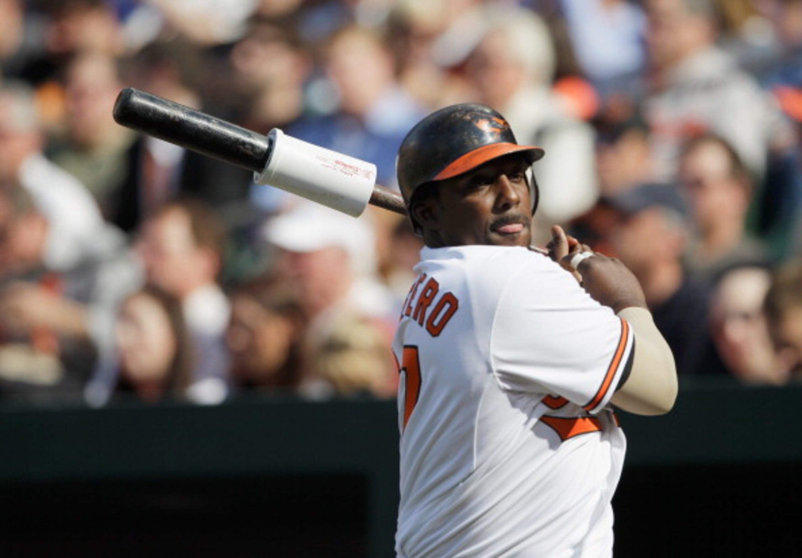 BALTIMORE, MD - APRIL 04:  Batter Vladimir Guerrero #27 of the Baltimore Orioles in the on deck circle against the Detroit Tigers during opening day at Oriole Park at Camden Yards on April 4, 2011 in Baltimore, Maryland.  (Photo by Rob Carr/Getty Images)
