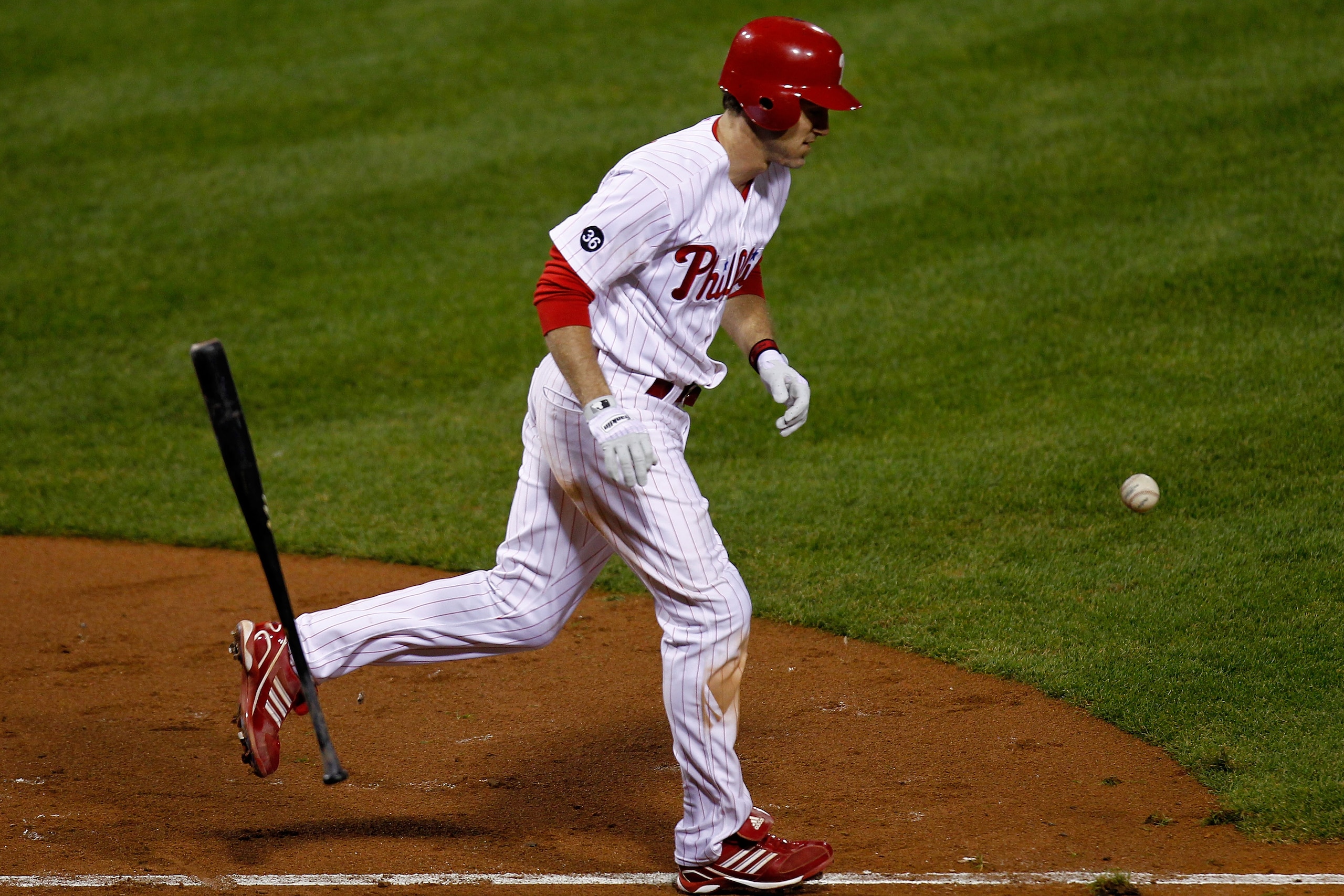 PHILADELPHIA - OCTOBER 23:  Chase Utley #26 of the Philadelphia Phillies runs to first after being hit by a pitch in the third inning against the San Francisco Giants in Game Six of the NLCS during the 2010 MLB Playoffs at Citizens Bank Park on October 23