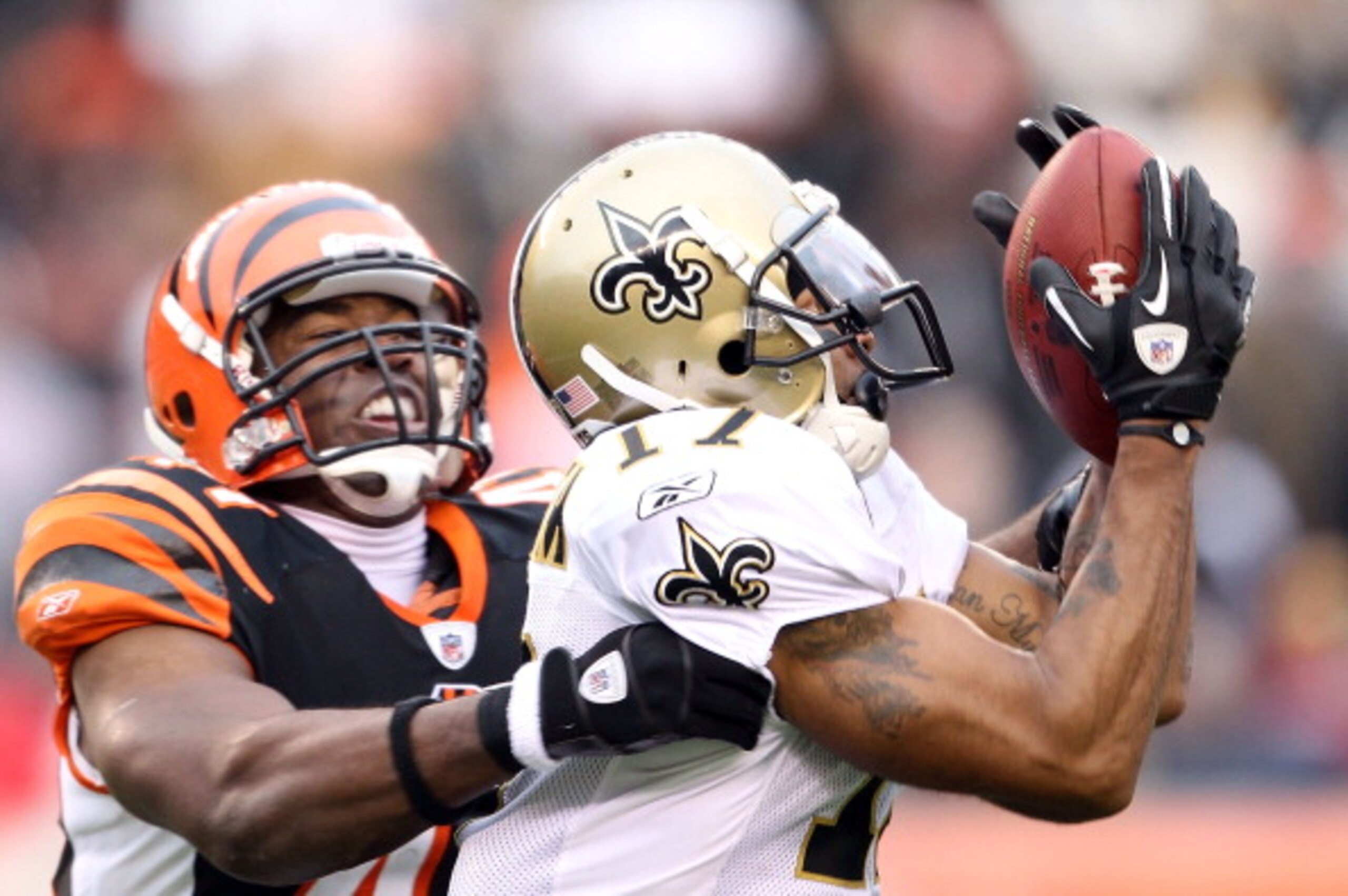 CINCINNATI, OH - DECEMBER 05: Robert Meachem #17 of the New Orleans Saints catches pass while defended by Chinedum Ndukwe #41 of the Cincinnati Bengals during the NFL game at Paul Brown Stadium on December 5, 2010 in Cincinnati, Ohio.  The Saints won 34-3