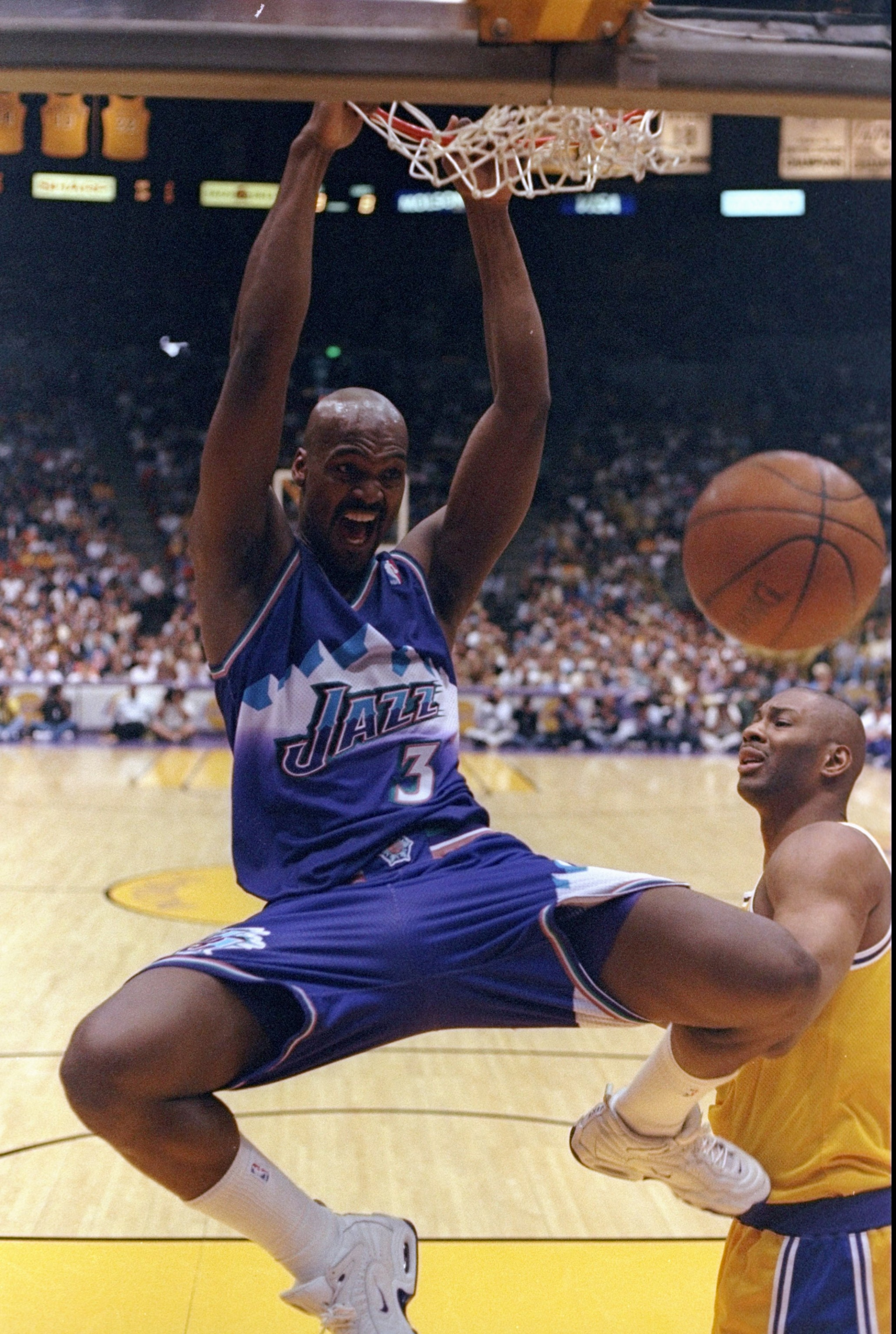 22 May 1998: Bryon Russell #3 of the Utah Jazz slam dunks the ball during game three of the Western Conference Finals against the Los Angeles Lakers at the Great Western Forum in Inglewood, California. The Jazz defeated the Lakers 109-98.
