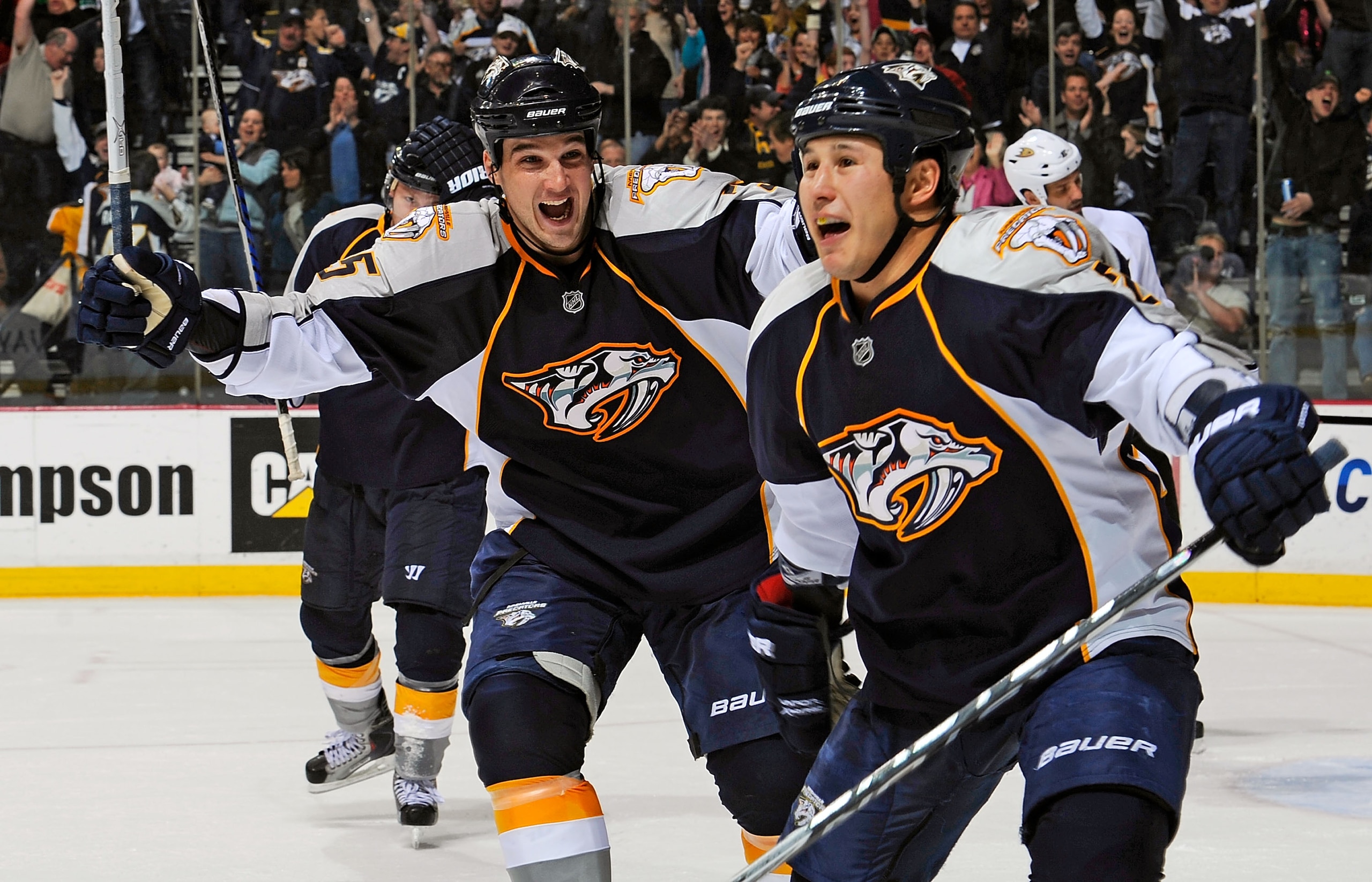 NASHVILLE, TN - MARCH 24:   Shane O'Brien #55 of the Nashville Predators congratulates teammate Jordin Tootoo #22 on scoring a goal against the Anaheim Ducks on March 24, 2011 at the Bridgestone Arena in Nashville, Tennessee.  (Photo by Frederick Breedon/
