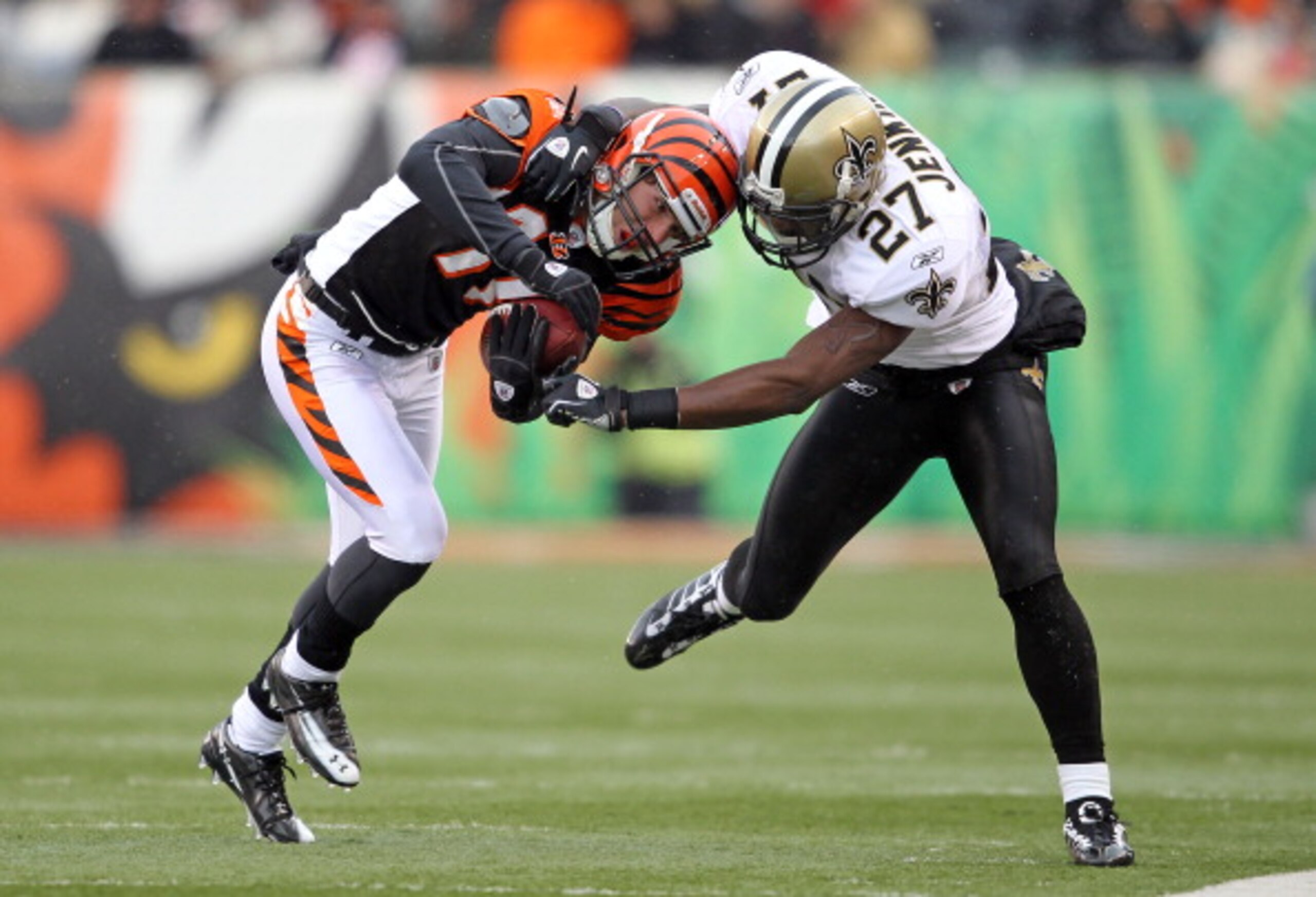 CINCINNATI, OH - DECEMBER 05: Malcolm Jenkins #27 of the New Orleans Saints tackles Jordan Shipley #11 of the Cincinnati Bengals during the NFL game at Paul Brown Stadium on December 5, 2010 in Cincinnati, Ohio.  The Saints won 34-30.  (Photo by Andy Lyon