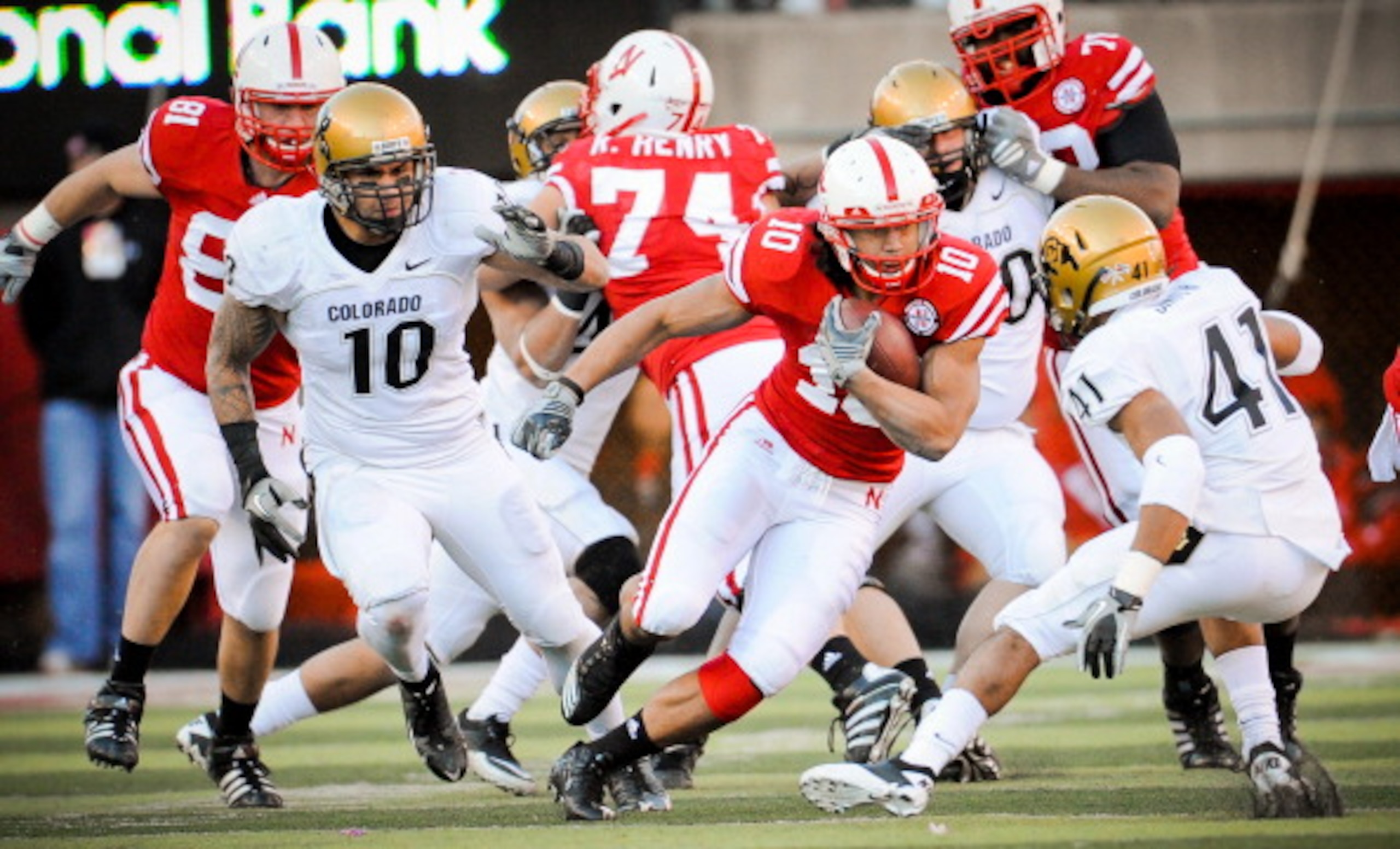 LINCOLN, NE - NOVEMBER 26: Roy Helu Jr. #10 of the Nebraska Cornhuskers weaves his way though the Colorado Buffalo defense during their game at Memorial Stadium on November 26, 2010 in Lincoln, Nebraska. Nebraska defeated Colorado 45-17 (Photo by Eric Fra LINCOLN, NE - NOVEMBER 26: Roy Helu Jr. #10 of the Nebraska Cornhuskers weaves his way though the Colorado Buffalo defense during their game at Memorial Stadium on November 26, 2010 in Lincoln, Nebraska. Nebraska defeated Colorado 45-17 (Photo by Eric Fra