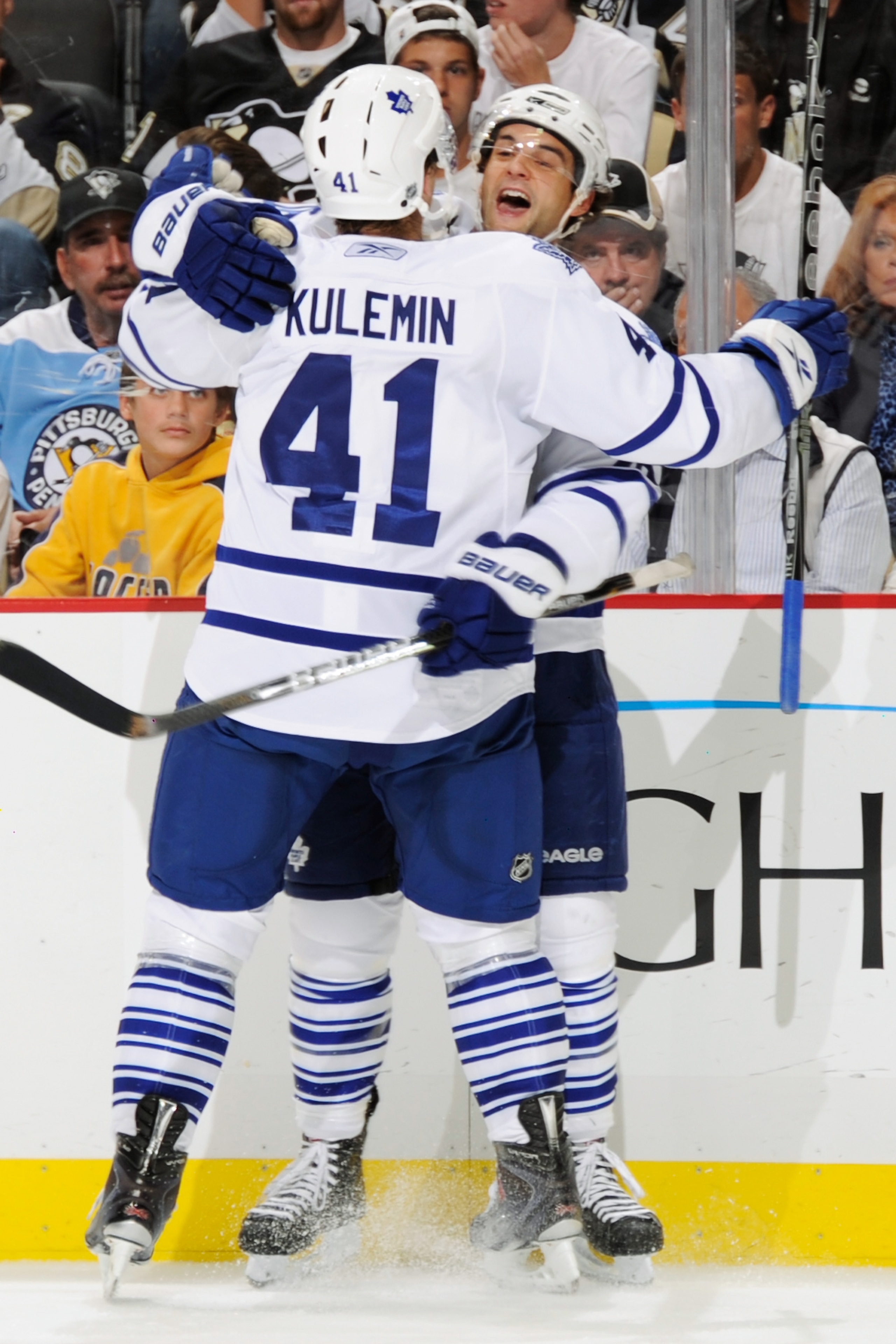 PITTSBURGH - OCTOBER 13:  Clarke MacArthur #16 of the Toronto Maple Leafs celebrates his second goal of the second period against the Pittsburgh Penguins with teammate Nikolai Kulemin #41 of the Toronto Maple Leafs on October 13, 2010 at Consol Energy Cen