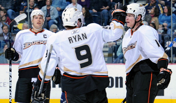 NASHVILLE, TN - MARCH 24:  Bobby Ryan #9 and Ryan Getzlaf #15 of the Anaheim Ducks congratulate teammate Corey Perry #10 after scoring a goal against the Nashville Predators on March 24, 2011 at the Bridgestone Arena in Nashville, Tennessee.  (Photo by Fr