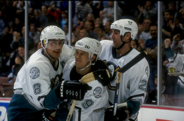 21 Oct 1998: Rightwinger Teemu Selanne #8, leftwinger Paul Kariya #9 and center Steve Rucchin #20 of the Anaheim Mighty Ducks in action during a game against the Boston Bruins at the Arrowhead Pond in Anaheim, California. The Ducks defeated the Bruins 3-0