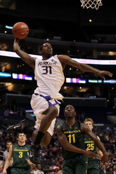 LOS ANGELES, CA - MARCH 11: Terrence Ross #31 of the Washington Huskies goes up for a dunk late in the second half while taking on the Oregon Ducks in the semifinals of the 2011 Pacific Life Pac-10 Men's Basketball Tournament at Staples Center on March 1