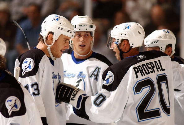 ATLANTA  -  OCTOBER 20 :  Vaclav Prospal #20, Pavel Kubina #13 and Vincent Lecavalier #4 of the Tampa Bay Lightning celebrate after a goal against the Atlanta Thrashers October 20, 2005 at Philips Arena in Atlanta, Georgia. The Lightning won the game 6-0.