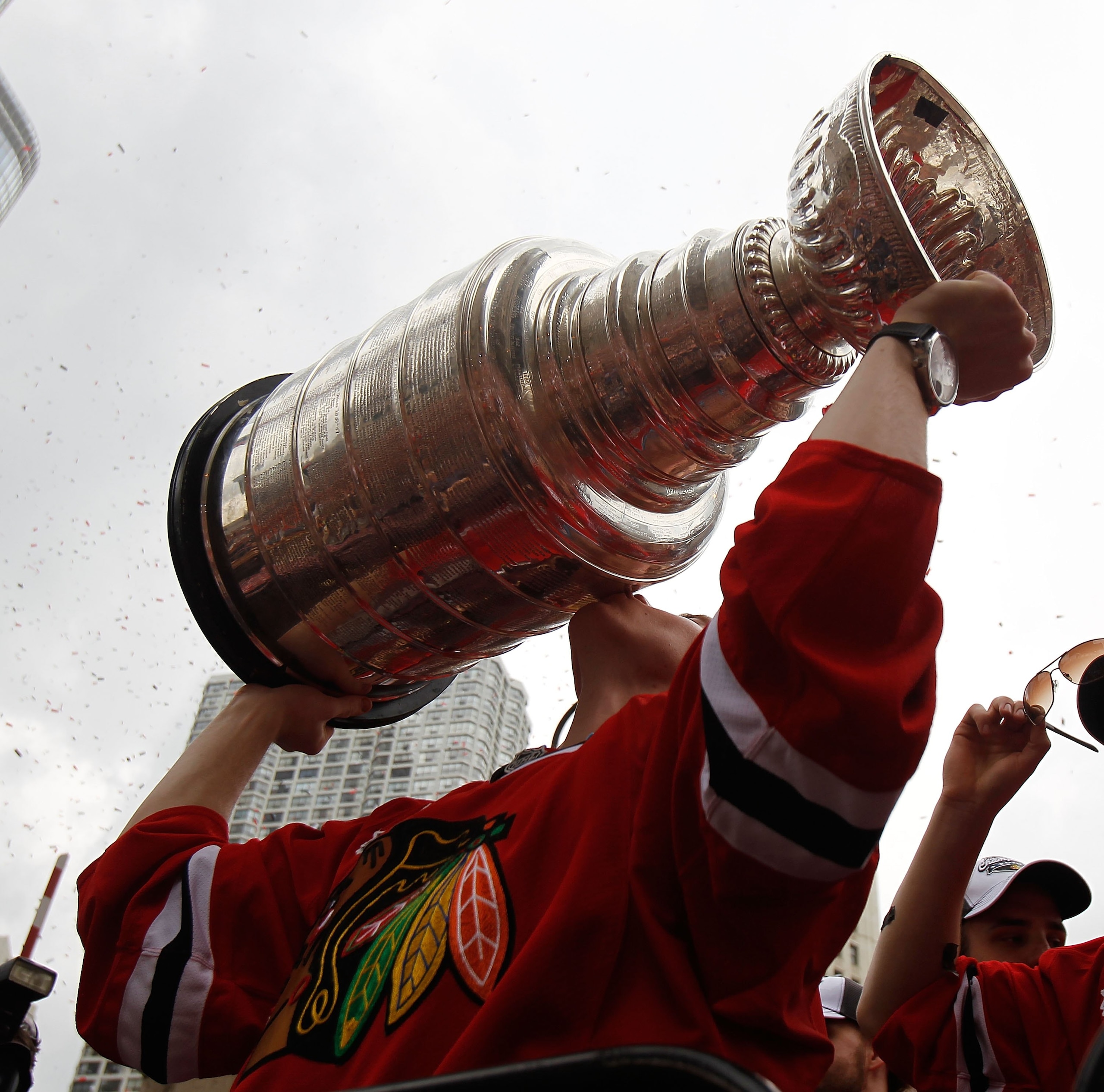 CHICAGO - JUNE 11: Patrick Kane #88 kisses the cup during the Chicago Blackhawks Stanley Cup victory parade and rally on June 11, 2010 in Chicago, Illinois. (Photo by Jonathan Daniel/Getty Images)