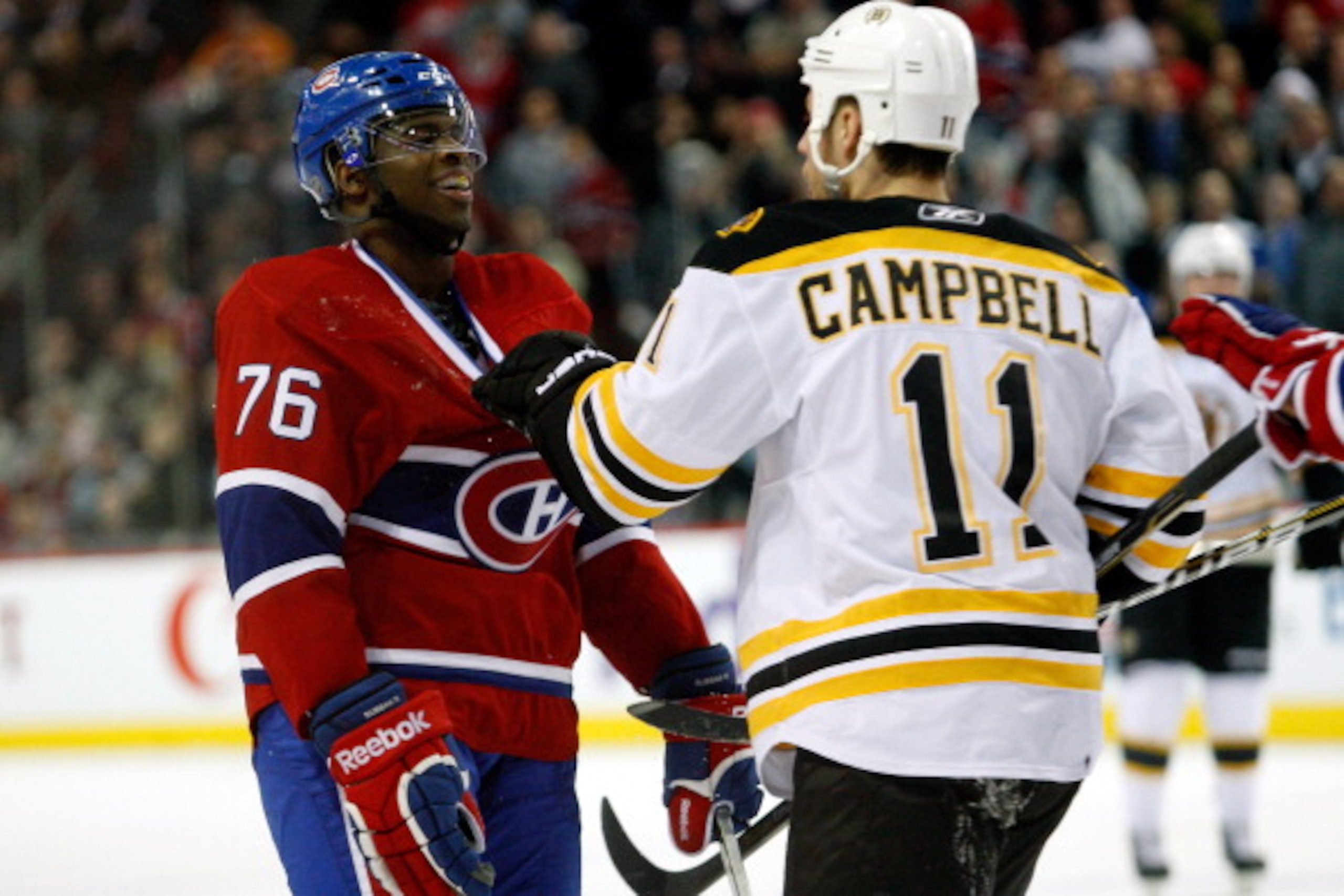 MONTREAL, CANADA - DECEMBER 16:  P.K. Subban #76 of the Montreal Canadiens and Gregory Campbell #11 of the Boston Bruins exchange words during the NHL game at the Bell Centre on December 16, 2010 in Montreal, Quebec, Canada.  (Photo by Richard Wolowicz/Ge