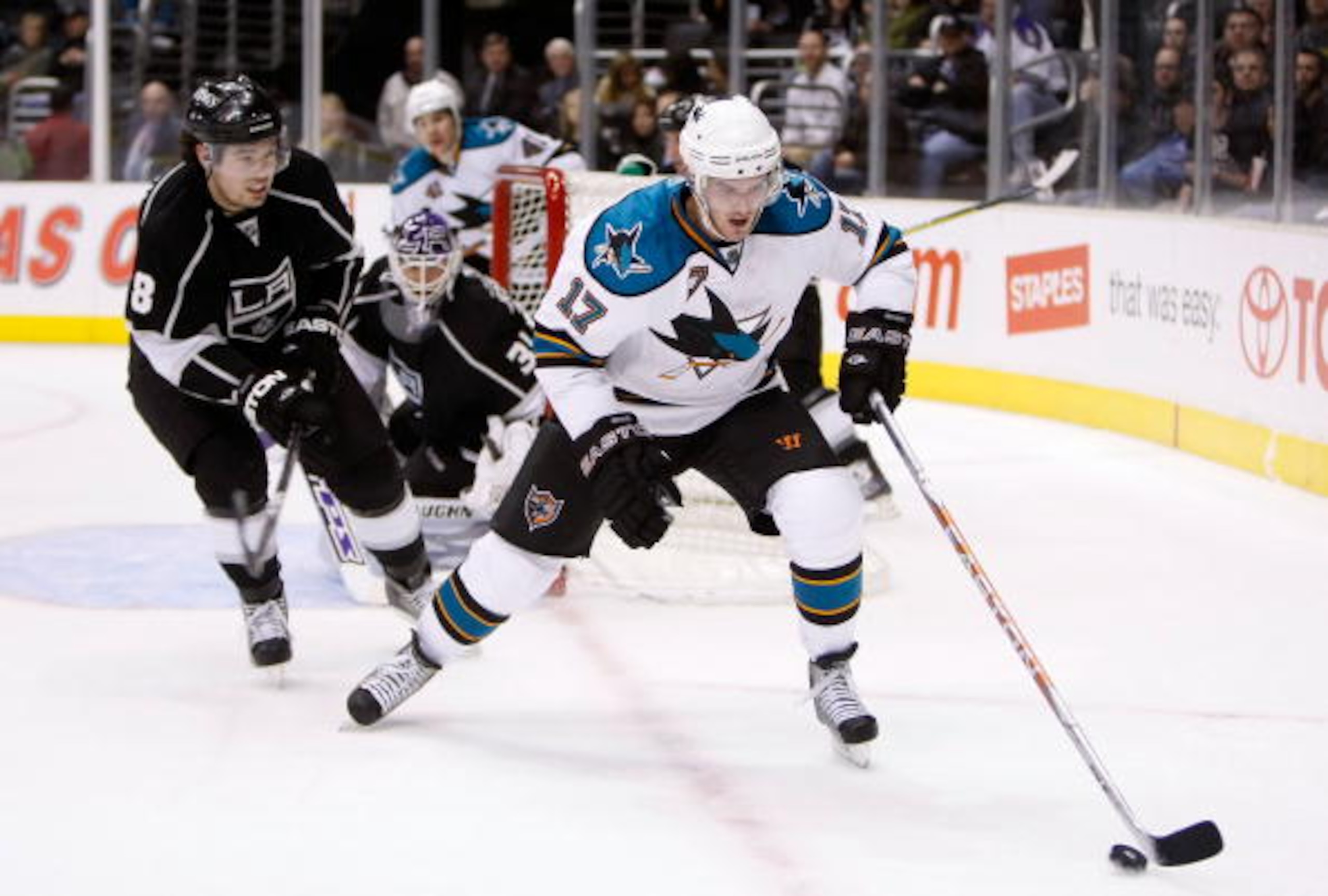 LOS ANGELES, CA - JANUARY 11:  Torrey Mitchell #17 of the San Jose Sharks is pursued by Drew Doughty #8 of the Los Angeles Kings at Staples Center on January 11, 2010 in Los Angeles, California.  (Photo by Jeff Gross/Getty Images)