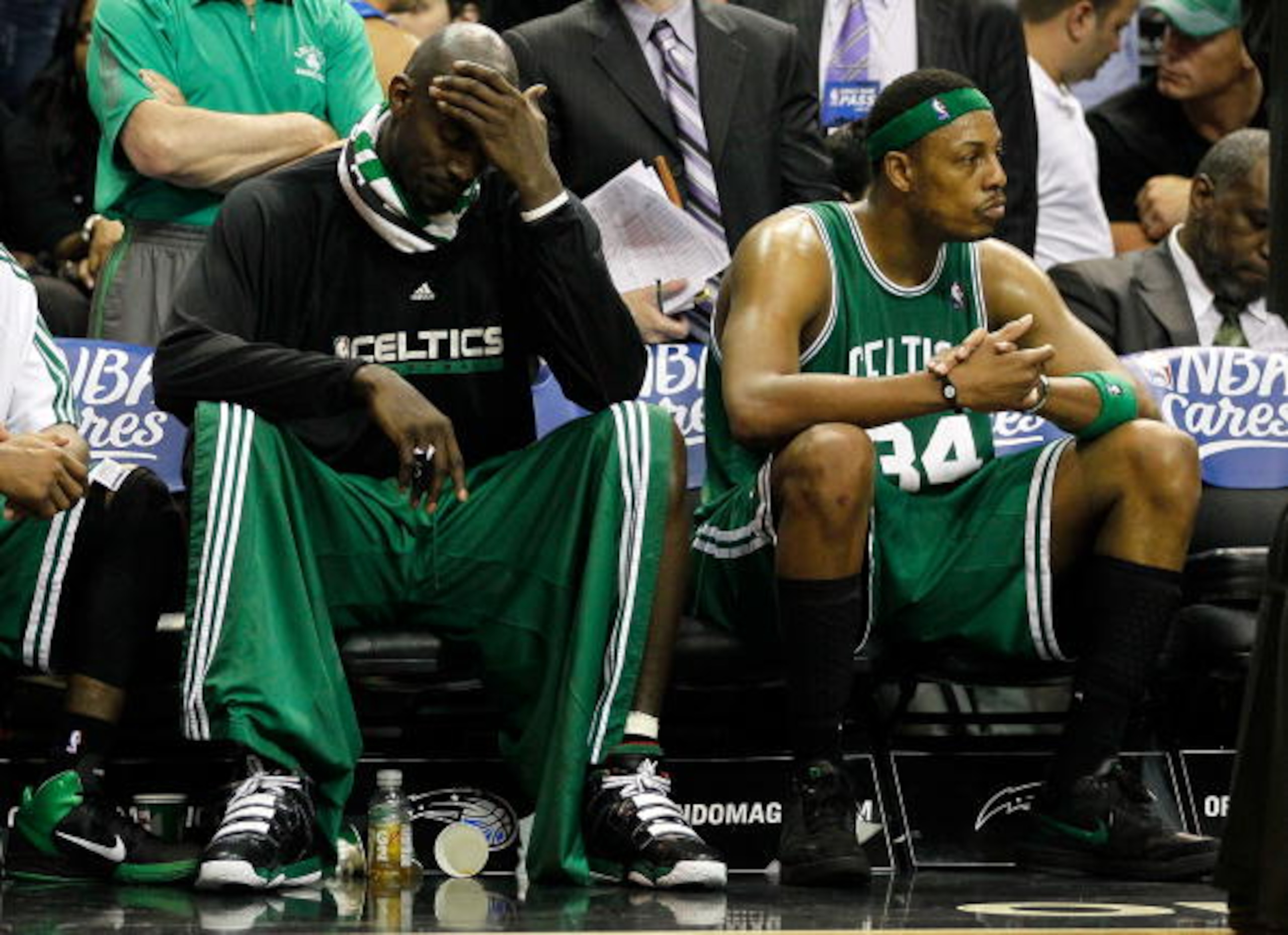 ORLANDO, FL - MAY 26:   Keivn Garnett #5 and Paul Pierce #34 of the Boston Celtics look on dejected from the bench in the final minutes of their 113-92 loss to the Orlando Magic in Game Five of the Eastern Conference Finals during the 2010 NBA Playoffs at