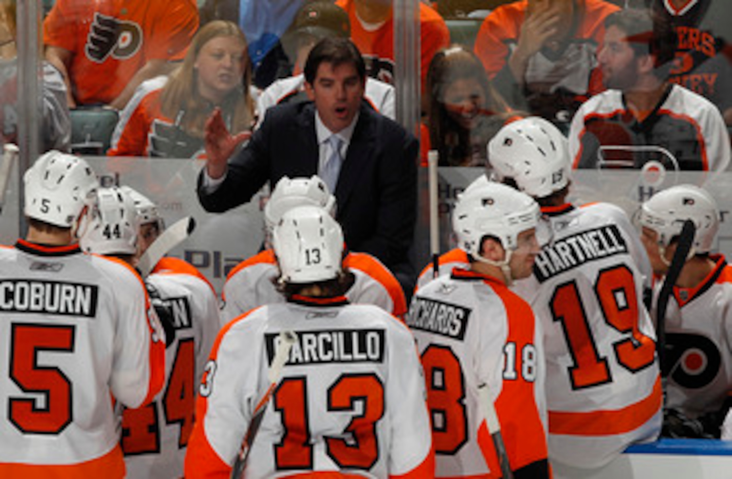 SUNRISE, FL - FEBRUARY 16: Head coach Peter Laviolette of the Philadelphia Flyers talks to the team during a time out against the Florida Panthers on February 16, 2011 at the BankAtlantic Center in Sunrise, Florida. The Flyers defeated the Panthers 4-2. (