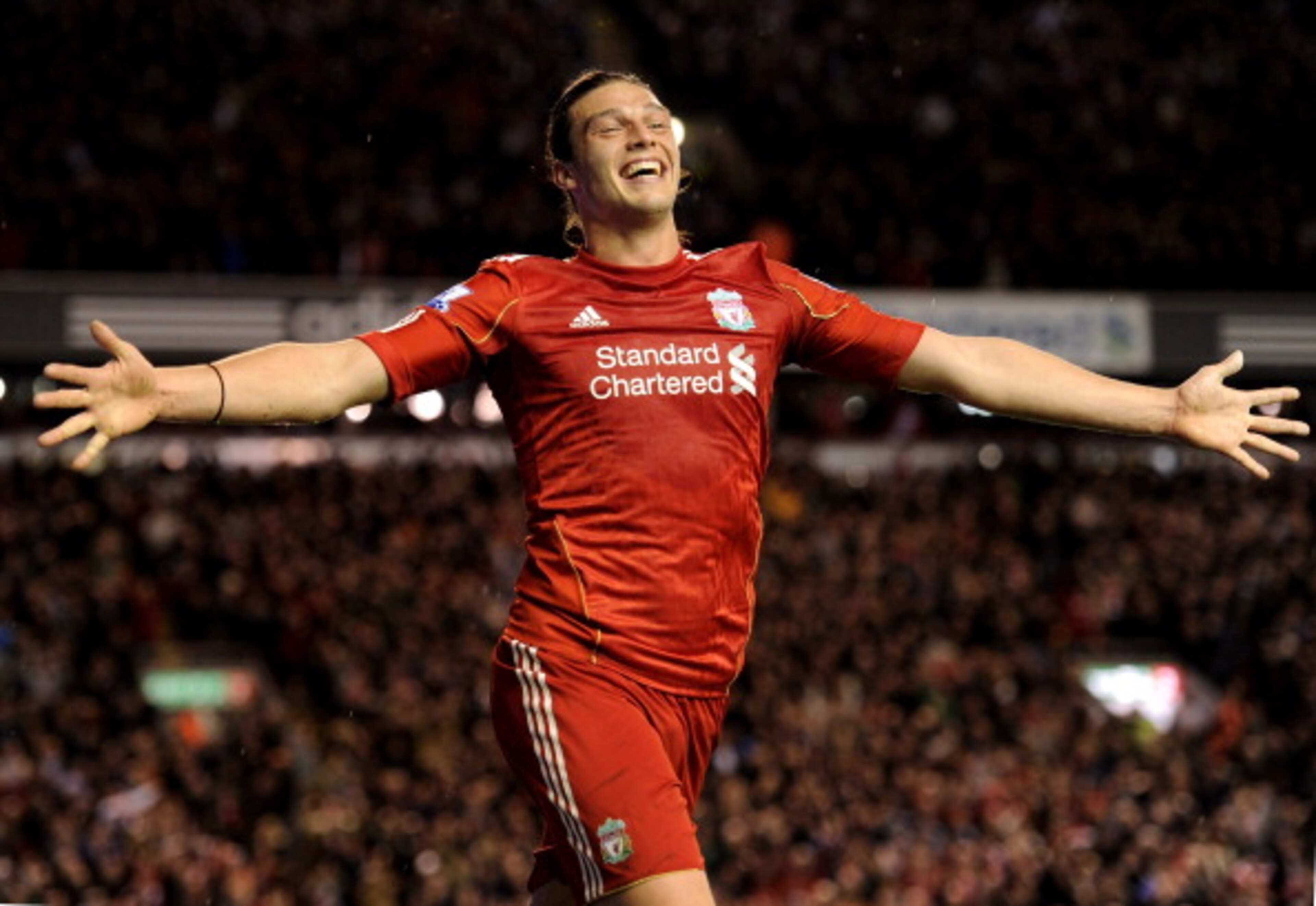 LIVERPOOL, ENGLAND - APRIL 11: Andy Carroll of Liverpool celebrates scoring his team's third goal during the Barclays Premier League match between Liverpool and Manchester City at Anfield on April 11, 2011 in Liverpool, England. (Photo by Michael Regan/ LIVERPOOL, ENGLAND - APRIL 11: Andy Carroll of Liverpool celebrates scoring his team's third goal during the Barclays Premier League match between Liverpool and Manchester City at Anfield on April 11, 2011 in Liverpool, England. (Photo by Michael Regan/