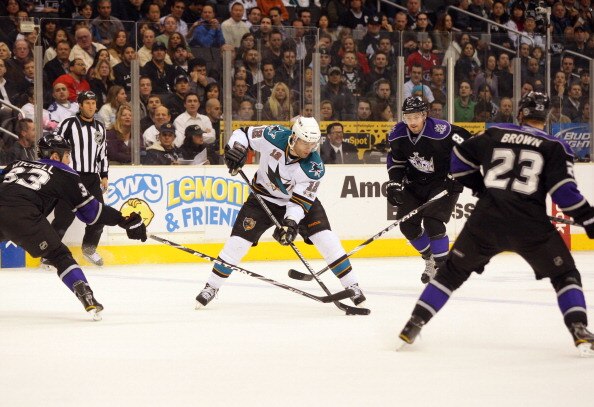 LOS ANGELES, CA - JANUARY 26:  Patrick Marleau #12 of the San Jose Sharks makes a drop pass between his skates on the counterattack against the Los Angeles Kings during their NHL game at Staples Center on January 26, 2011 in Los Angeles, California. The K